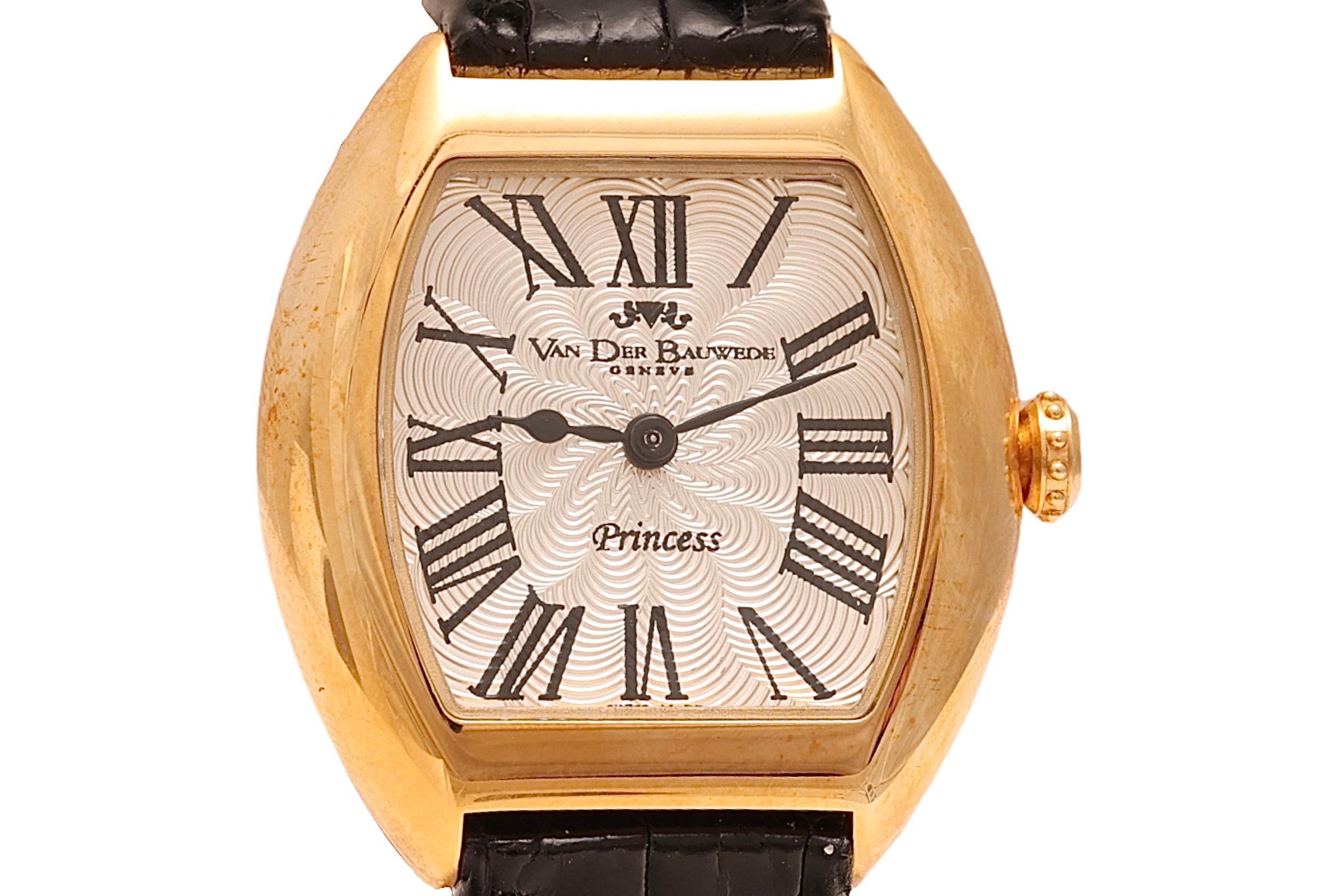 New Van Der Bauwede Princess in 18 kt. Yellow Gold Automatic Wristwatch With Box and Papers

Movement: Automatic

Functions: Hours, minutes

Case: 18 kt. yellow gold, diameter 27 mm x 29 mm, height 8.5 mm, sapphire glass, see through back, back