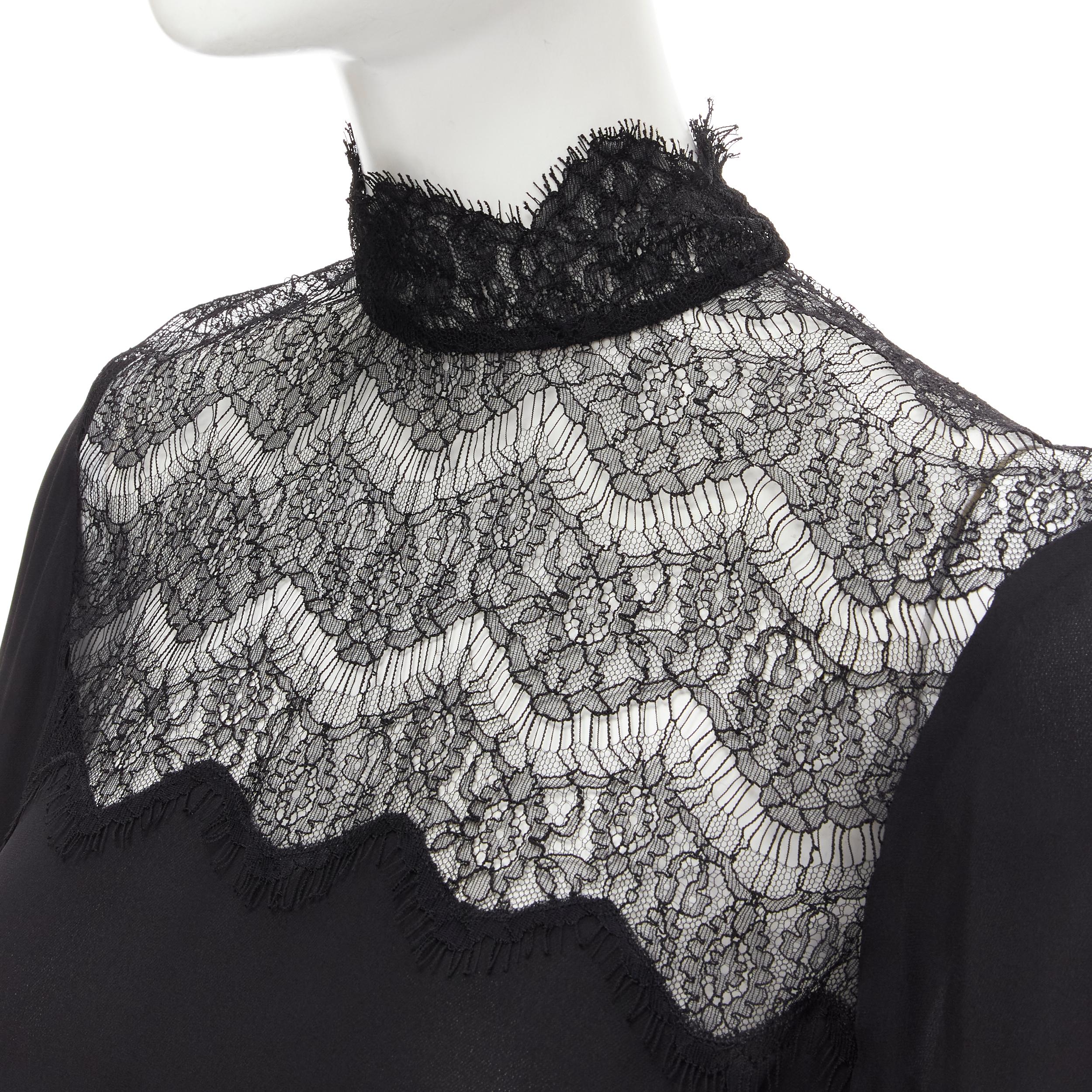 new VERONIQUE BRANQUINHO black 100% silk lace insert long sleeve blouse shirt IT40 XS 
Reference: MELK/A00148 
Brand: Veronique Branquinho 
Material: Silk 
Color: Black 
Pattern: Solid 
Closure: Button 
Extra Detail: Lace insert across chest. Stand