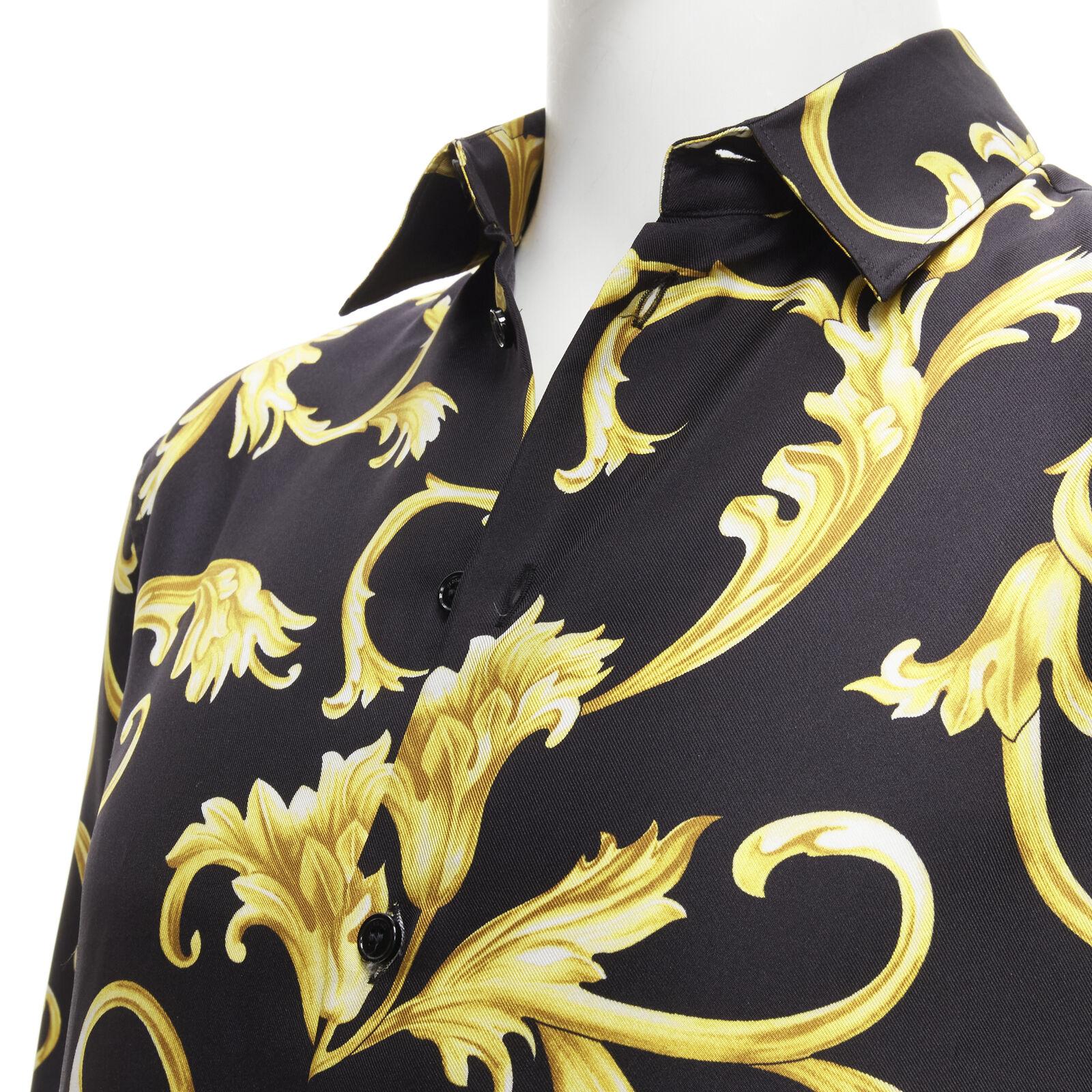 new VERSACE 100% silk black gold Barocco flora print relaxed shirt EU38 S
Reference: TGAS/C01469
Brand: Versace
Designer: Donatella Versace
Material: 100% Silk
Color: Black, Gold
Pattern: Floral
Closure: Button
Estimated Retail Price: USD 1200
Made