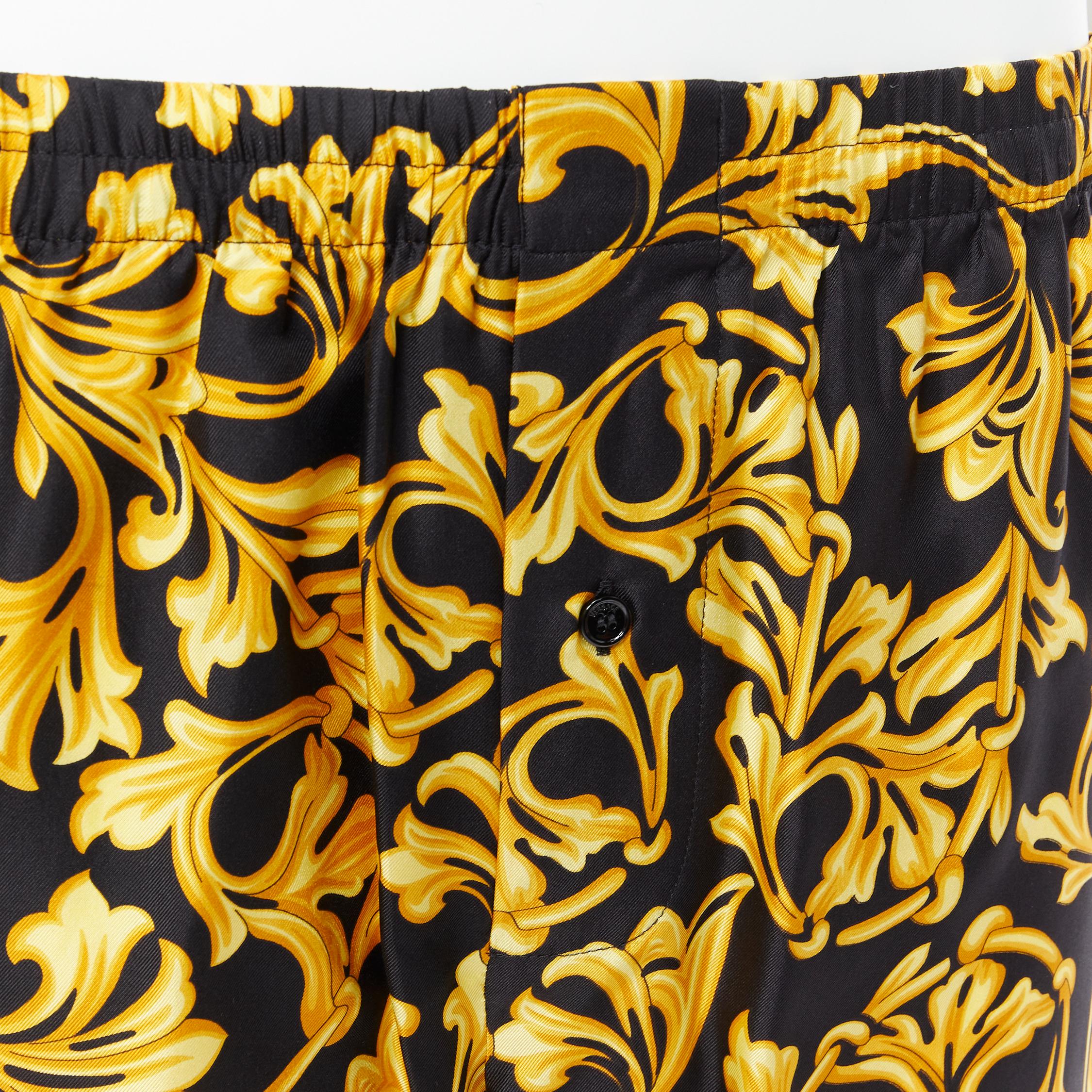 new VERSACE 100% silk black gold barocco floral print boxer shorts IT5 M 
Reference: TGAS/B00599 
Brand: Versace 
Designer: Donatella Versace 
Material: Silk 
Color: Black 
Pattern: Floral 
Extra Detail: Elasticated waist. Button fly front closure.