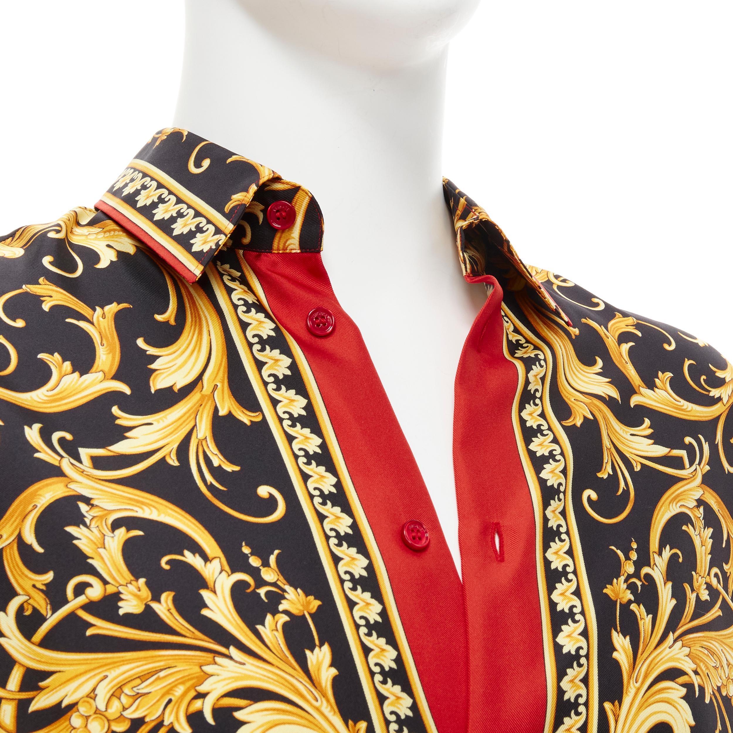 new VERSACE 100% silk black red gold Barocco Baroque leaf royal shirt EU41 L 
Reference: TGAS/B02109 
Brand: Versace 
Designer: Donatella Versace 
Material: Silk 
Color: Red Pattern: Floral Closure: Button 
Extra Detail: Heritage Fit. 
Made in: