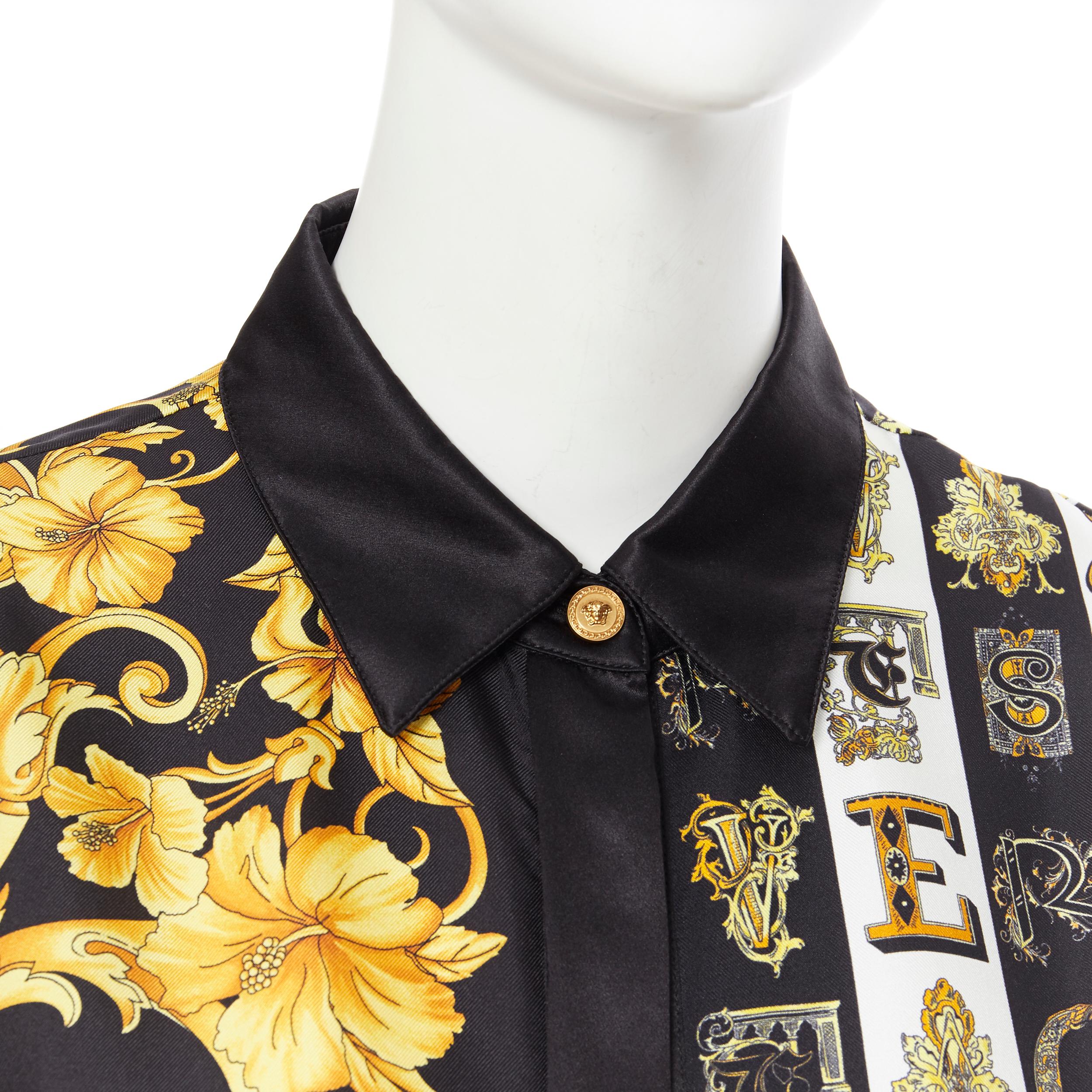 new VERSACE 100% silk gold black Hibiscus Baroque Virtus Alphabet shirt IT42 M
Brand: Versace
Designer: Donatella Versace
Collection: 2019
Model Name / Style: Silk shirt
Material: Silk
Color: Gold, black
Pattern: Floral
Closure: Button
Extra Detail: