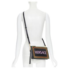 new VERSACE 1990's vintage logo black calf zip pouch crossbody clutch bag