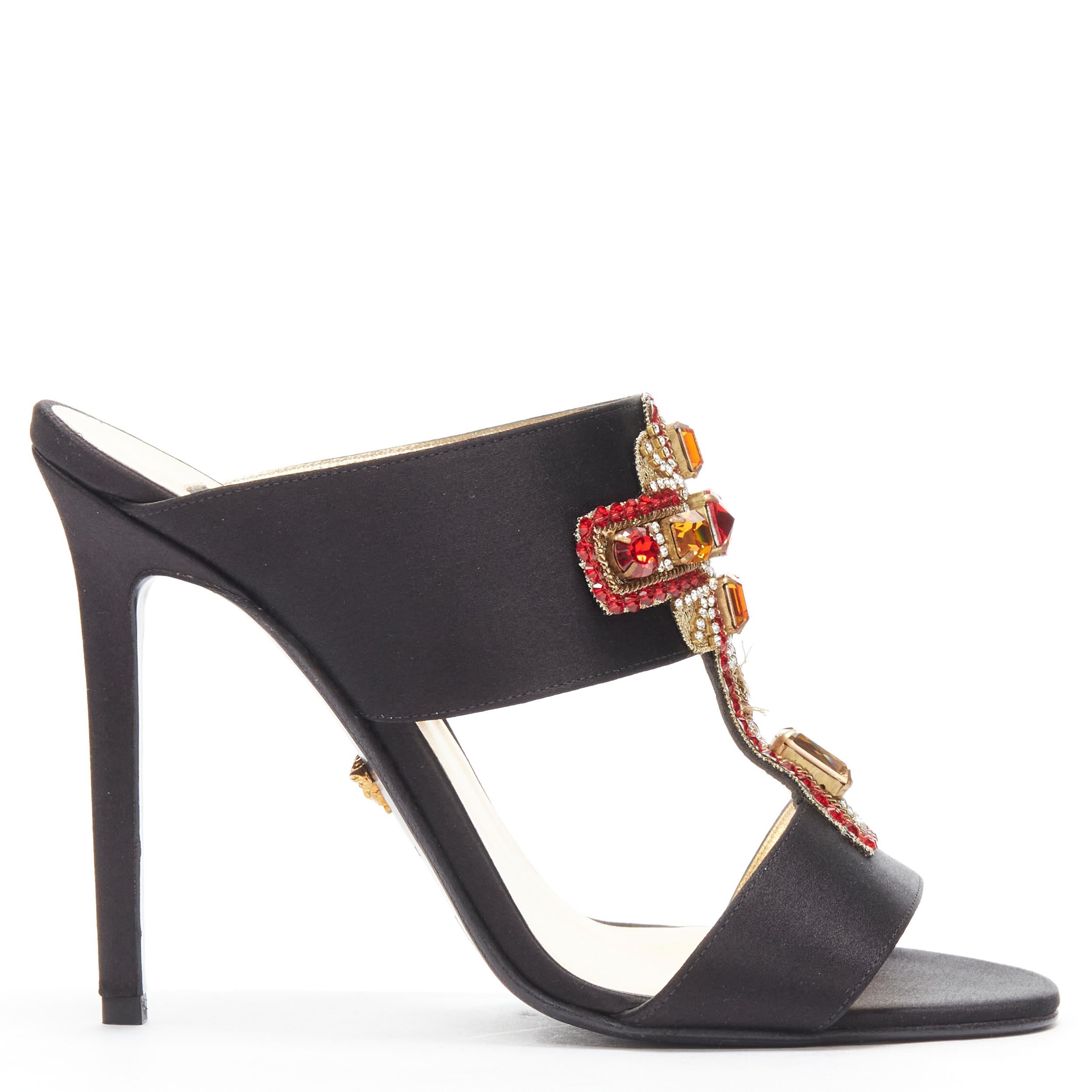 new VERSACE 2018 Tribute Byzantine Cross Jewel crystal black satin sandals EU38
Reference: TGAS/A04792
Brand: Versace
Designer: Donatella Versace
Collection: Spring Summer 2018 Runway
Material: Silk 
Color: Black 
Pattern: Solid 
Extra Detail: Black