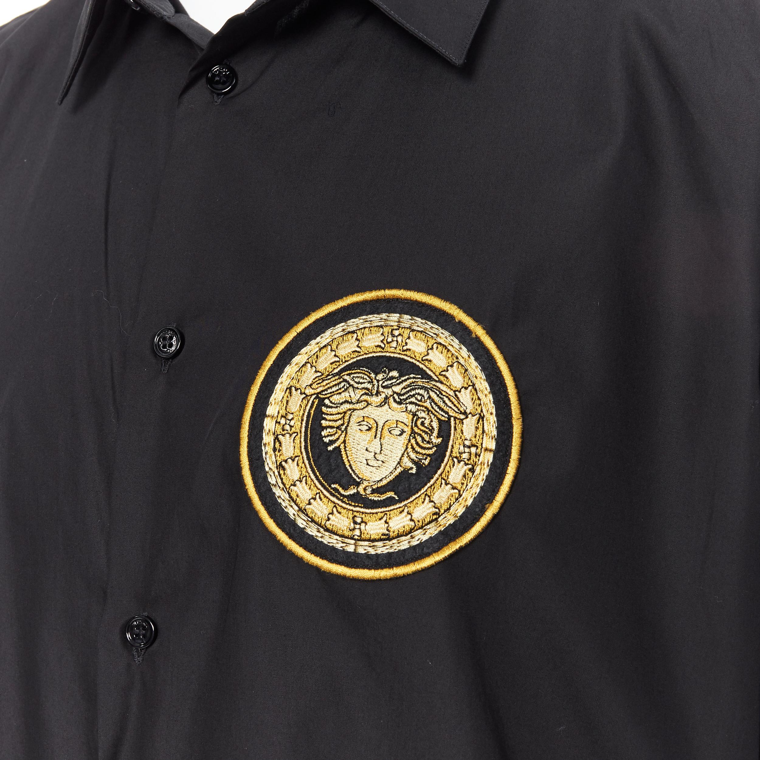 new VERSACE 2019 black cotton gold Medusa embroidery long sleeve shirt EU44 XXXL 
Reference: TGAS/A03958 
Brand: Versace 
Designer: Donatella Versace 
Material: Cotton 
Color: Black 
Pattern: Other 
Closure: Button 
Estimated Retail Price: US $420