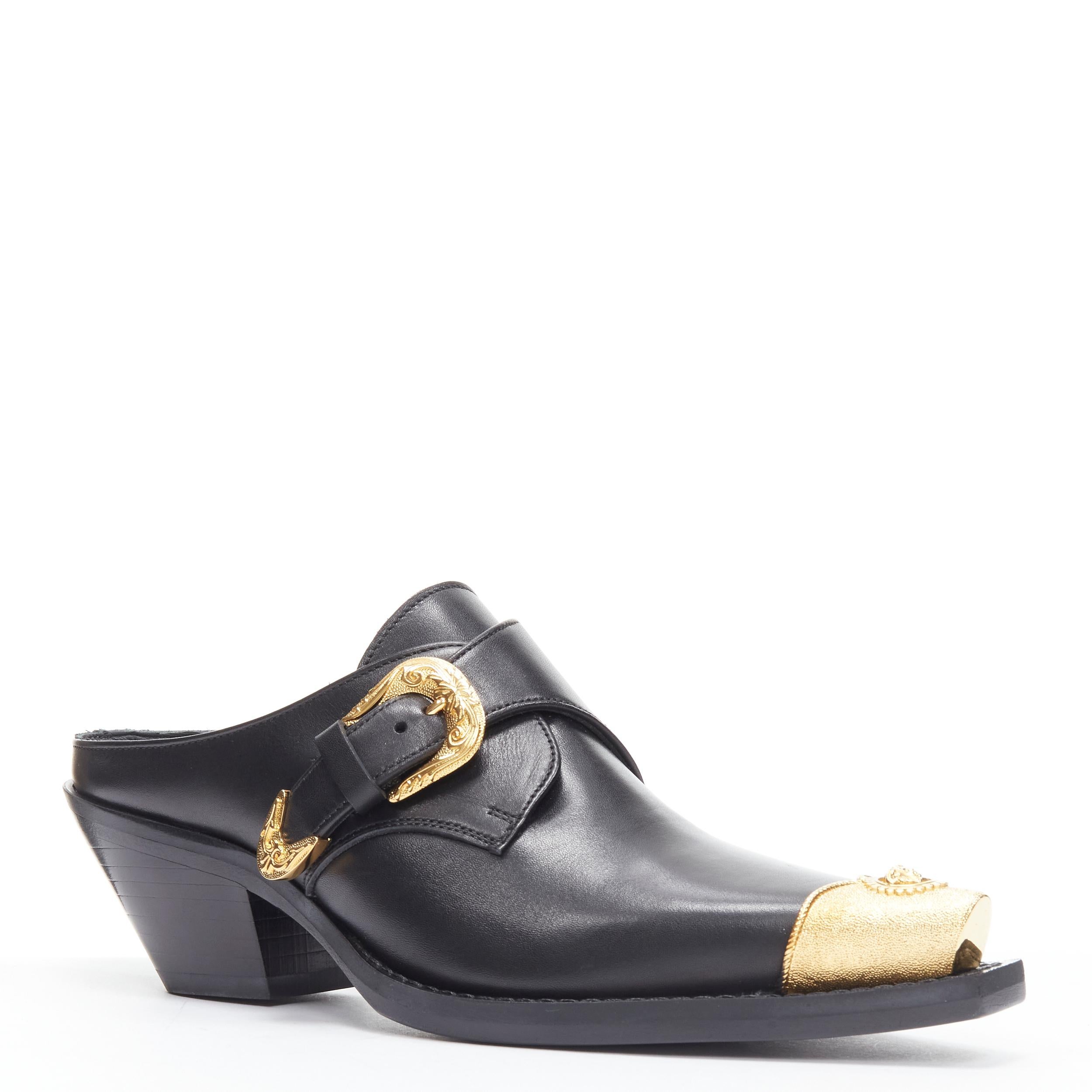 new VERSACE 2019 black leather gold Medusa toe western buckle cuban mule EU36 
Reference: TGAS/B01894 
Brand: Versace 
Designer: Donatella Versace 
Model: Metal toe mule 
Collection: 2019 Fall Winter Runway 
Material: Leather 
Color: Black 
Pattern: