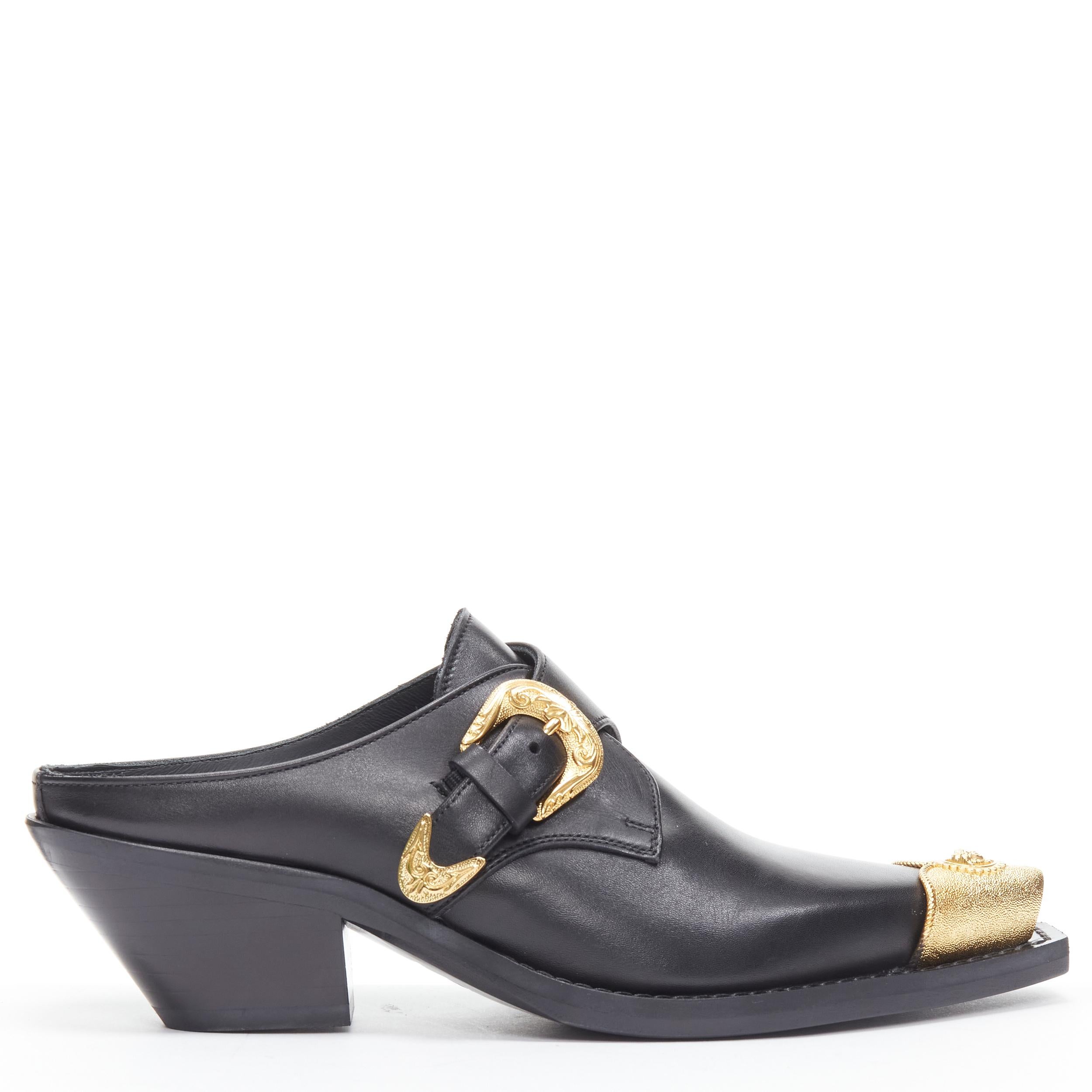 new VERSACE 2019 black leather gold Medusa toe western buckle cuban mule EU37 
Reference: TGAS/B01897 
Brand: Versace 
Designer: Donatella Versace 
Model: Metal toe mule 
Collection: 2019 Fall Winter Runway 
Material: Leather 
Color: Black 
Pattern: