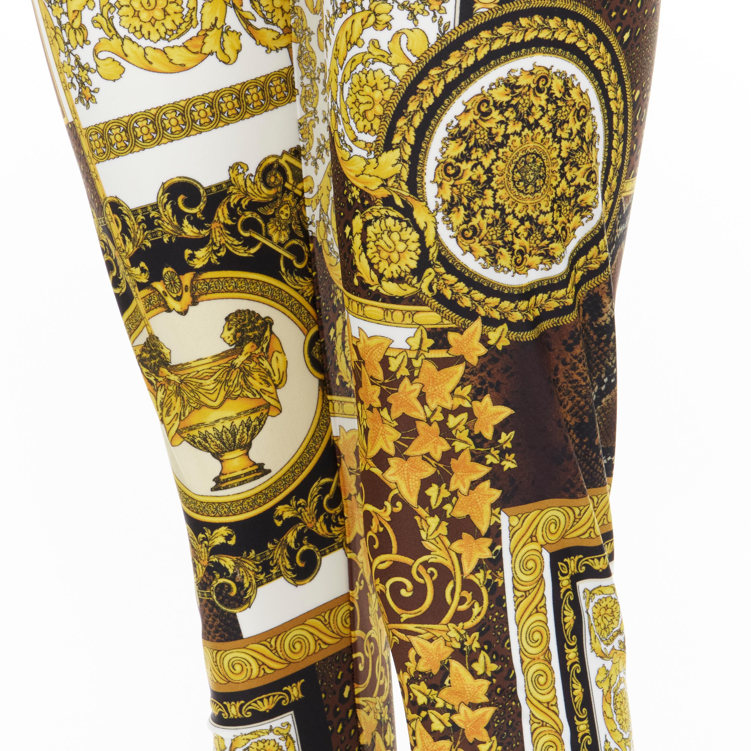new VERSACE 2021 Mosaic Barocco brown gold print stretchy legging pant IT44 L 
Reference: TGAS/C00605 
Brand: Versace 
Designer: Donatella Versace 
Collection: Resort 2021 
Material: Polyamide 
Color: Gold 
Pattern: Snakeskin 
Extra Detail: Stretch