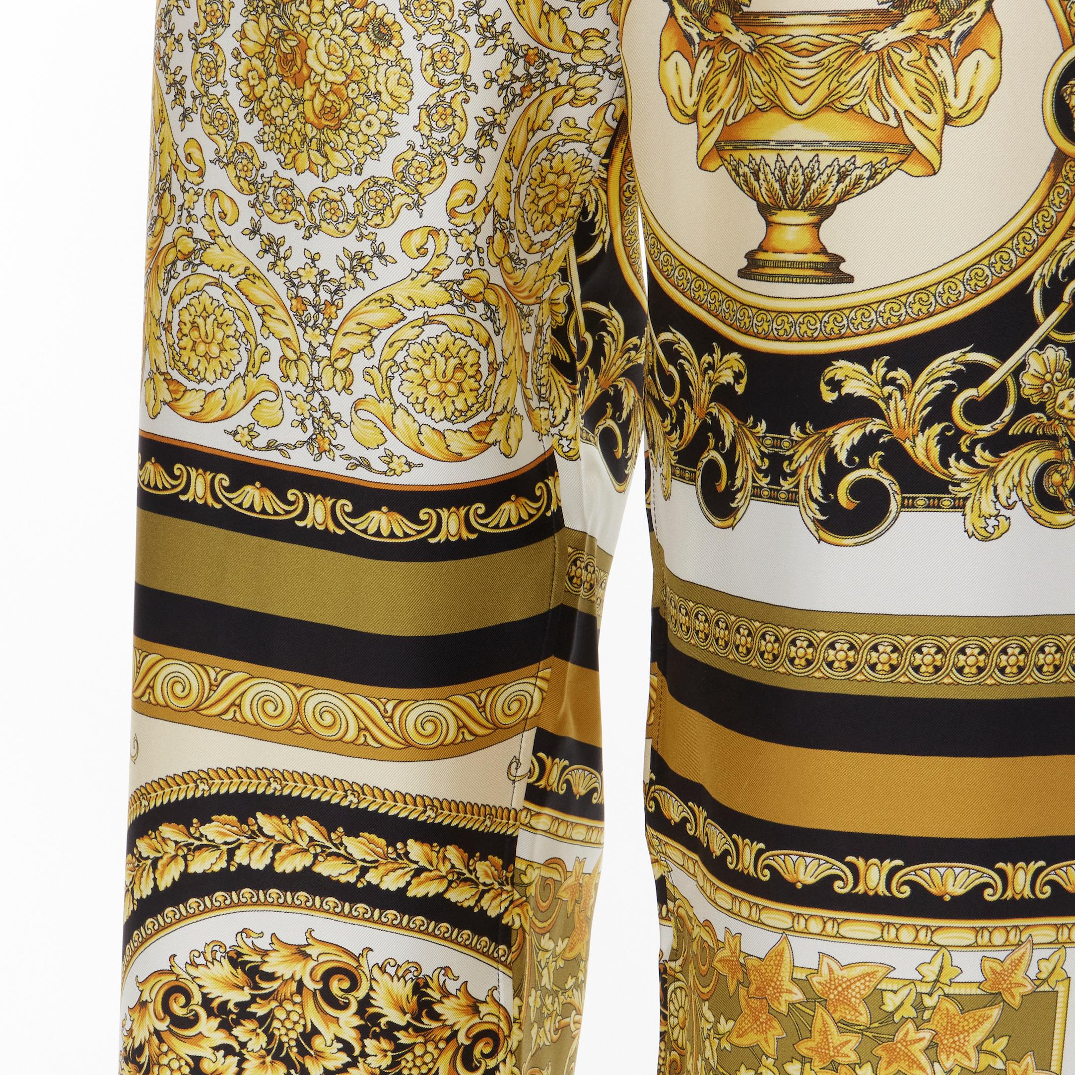 new VERSACE 2021 Mosaic Barocco gold black 100% silk print pajama pants IT2 XS 
Reference: TGAS/C00682 
Brand: Versace 
Designer: Donatella Versace 
Collection: Mosaic Barocco 
Material: Silk 
Color: Gold 
Pattern: Floral 
Closure: Stretch 
Extra