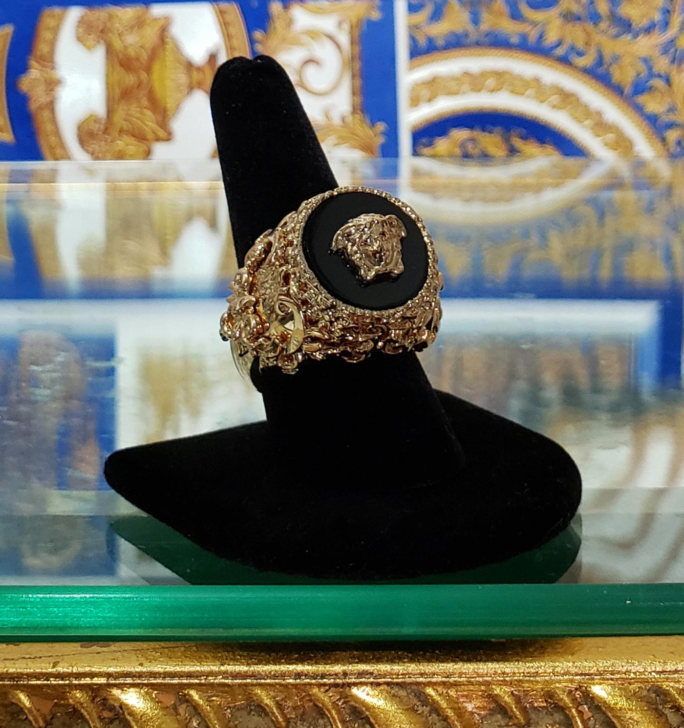 VERSACE

24K Gold Plated Medusa Ring

Black insert

Baroque pattern

Made in Italy

Brand new. Display model, got minor scratches.

100% authentic guarantee. Comes with Versace box.

 PLEASE VISIT OUR STORE FOR MORE GREAT ITEMS