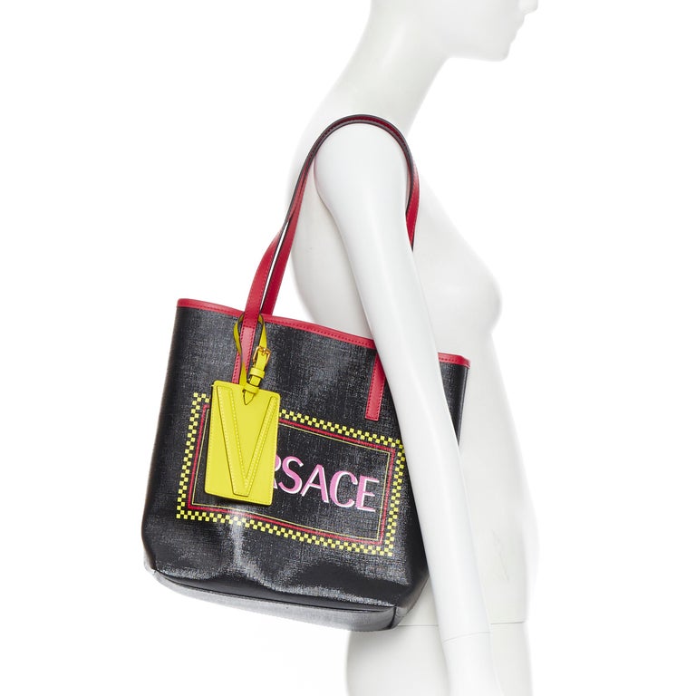new VERSACE 90's logo black glossy saffiano leather yellow V tag small tote  bag at 1stDibs