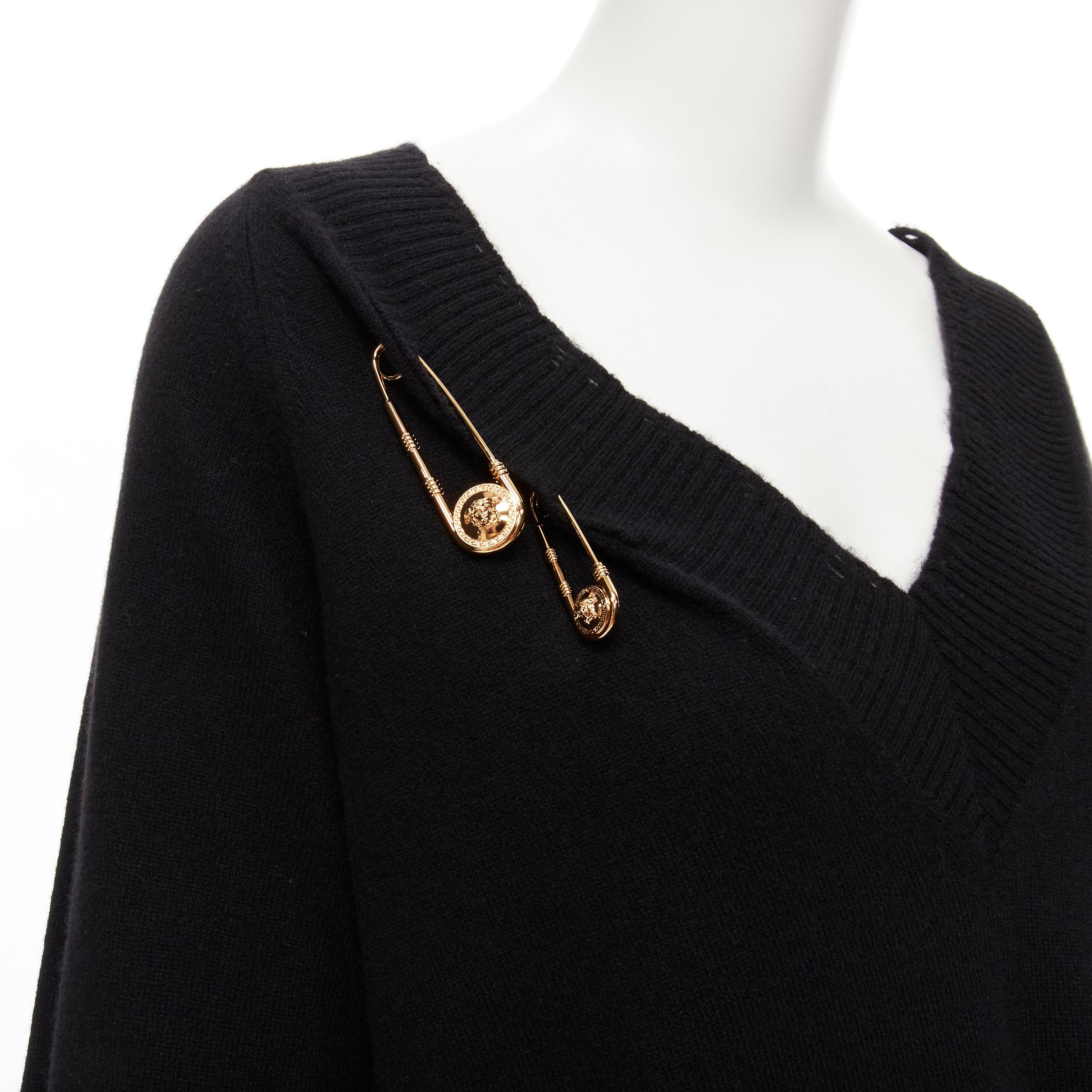 new VERSACE 95% cashmere wool gold Medusa safety pin punk sweater dress IT42 M 
Reference: TGAS/C00178 
Brand: Versace 
Designer: Donatella Versace 
\Material: Cashmere 
Color: Black 
Pattern: Solid 
Extra Detail: 95% cashmere, 5% wool. Black