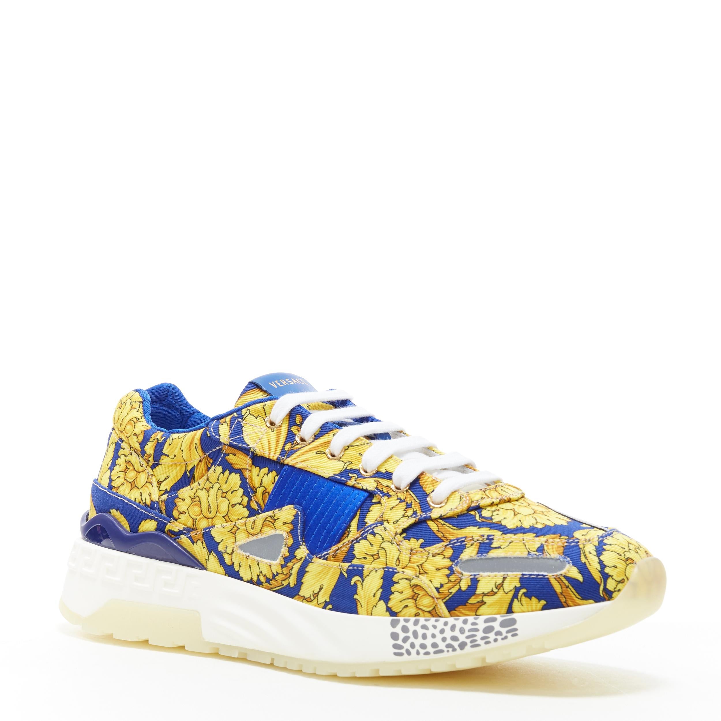 new VERSACE Achilles blue gold baroque pillow talk chunky sole dad sneakers EU43
Brand: Versace
Designer: Donatella Versace
Model Name / Style: Achilles sneakers
Material: Fabric
Color: Blue and gold
Pattern: Floral; baroque floral
Closure: Lace