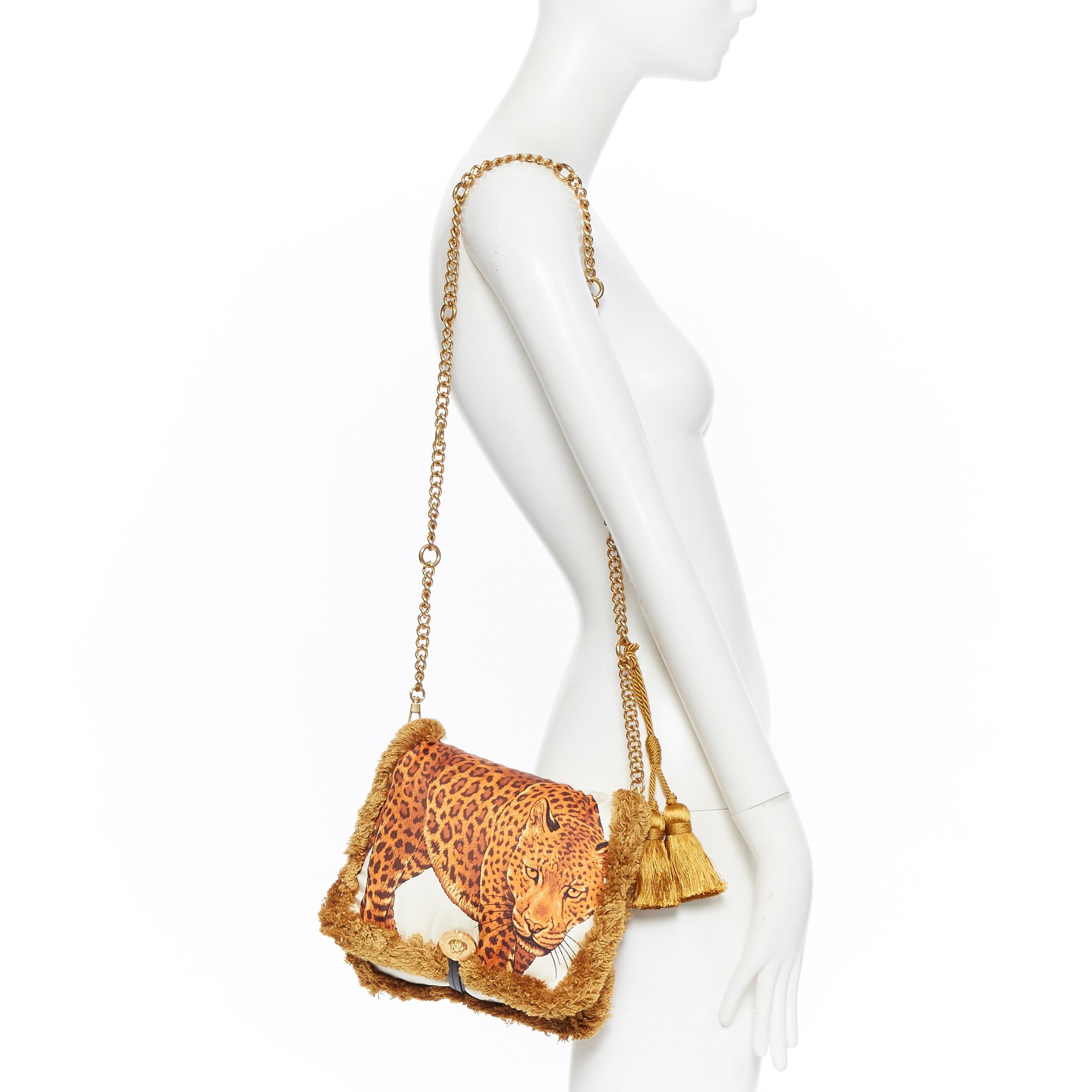 new VERSACE AW18 Runway Pillow Talk Wild Leopard print silk tassel shoulder bag
Brand: Versace
Designer: Donatella Versace
Collection: Fall Winter 2018
Model Name / Style: Pillow Talk
Material: Silk
Color: Orange
Pattern: Leopard
Closure: Zip
Extra