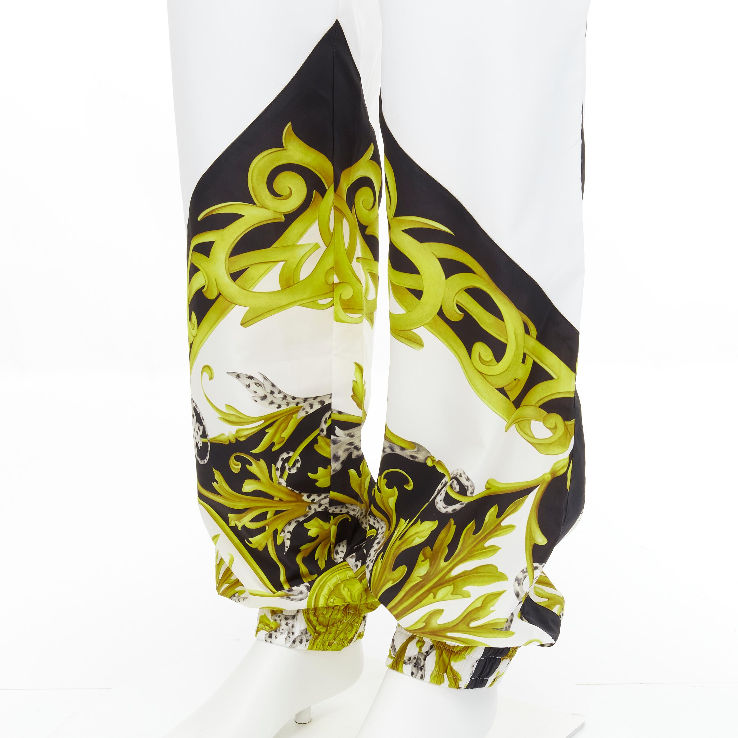 new VERSACE Barocco Acanthus black gold baroque white nylon track pants IT54 XXL 
Reference: TGAS/C00896 
Brand: Versace 
Designer: Donatella Versace 
Collection: Barocco Acanthus 
Material: Nylon 
Color: White 
Pattern: Floral 
Closure: Stretch