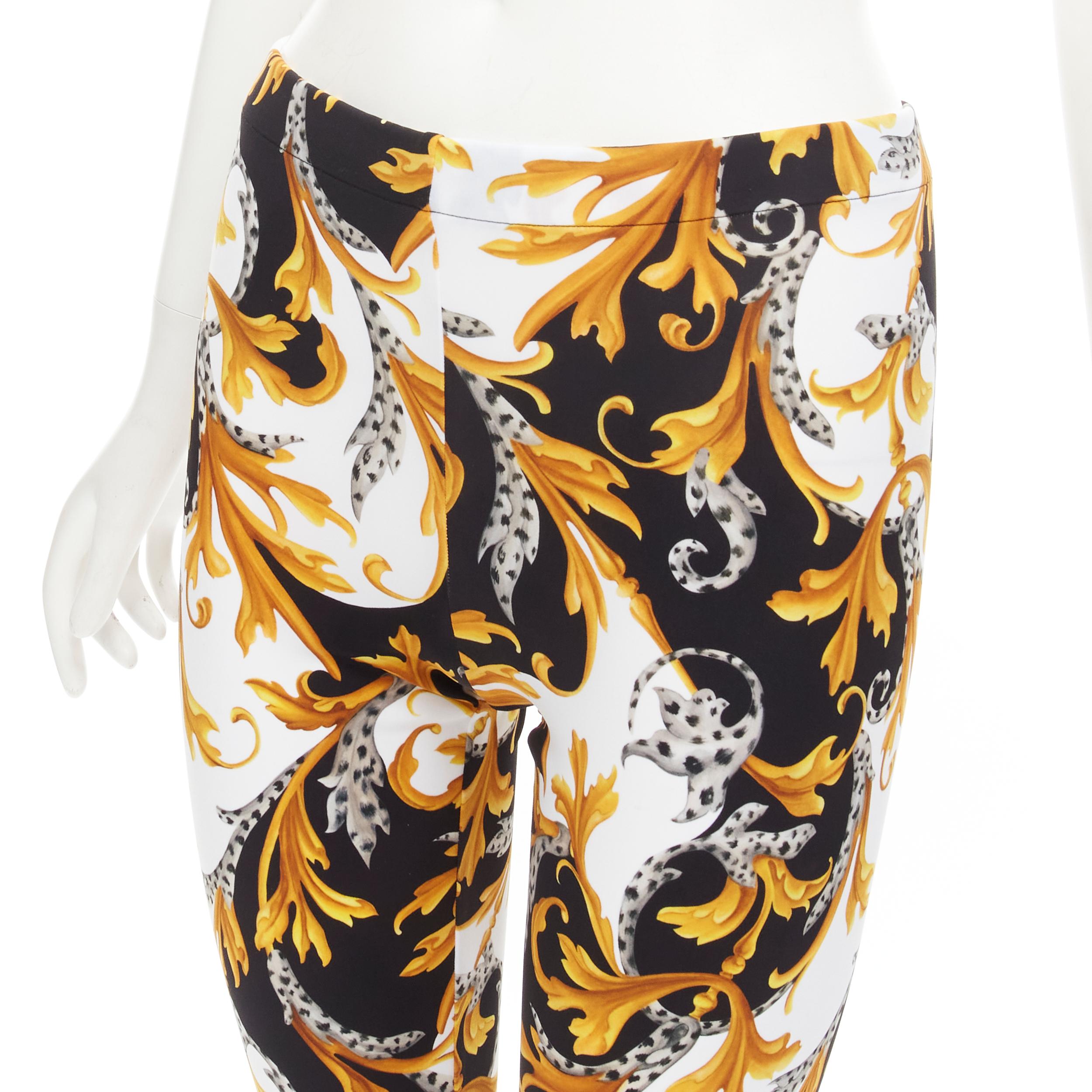 new VERSACE Barocco Acanthus black gold Signature floral legging pants IT40 S 
Reference: TGAS/C01065 
Brand: Versace 
Designer: Donatella Versace 
Collection: Barocco Acanthus 
Material: Polyamide 
Color: Gold 
Pattern: Floral 
Closure: Stretch