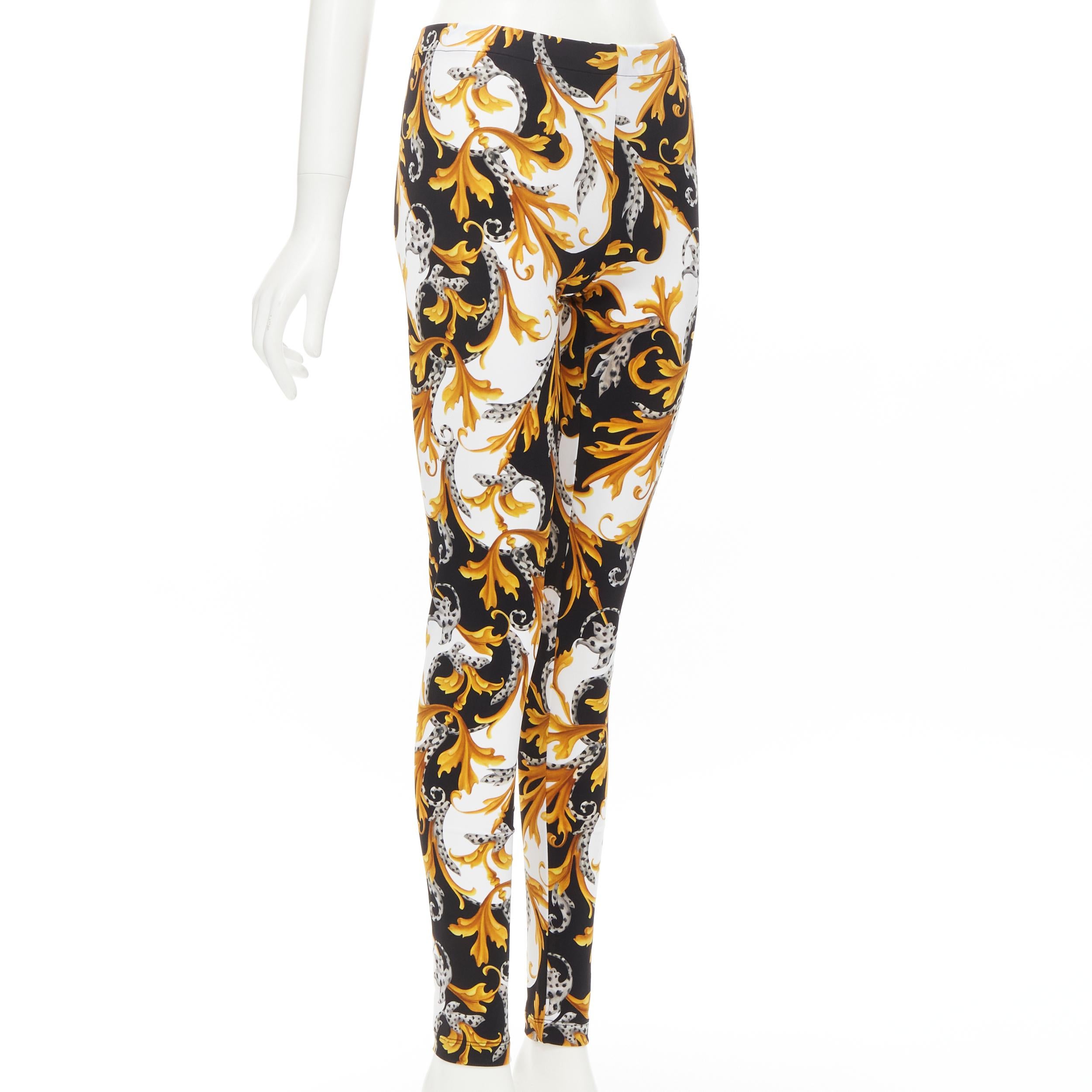 new VERSACE Barocco Acanthus black gold Signature floral legging pants IT44 L 
Reference: TGAS/C01061 
Brand: Versace 
Designer: Donatella Versace 
Collection: Barocco Acanthus 
Material: Polyamide 
Color: Gold 
Pattern: Floral 
Closure: Stretch