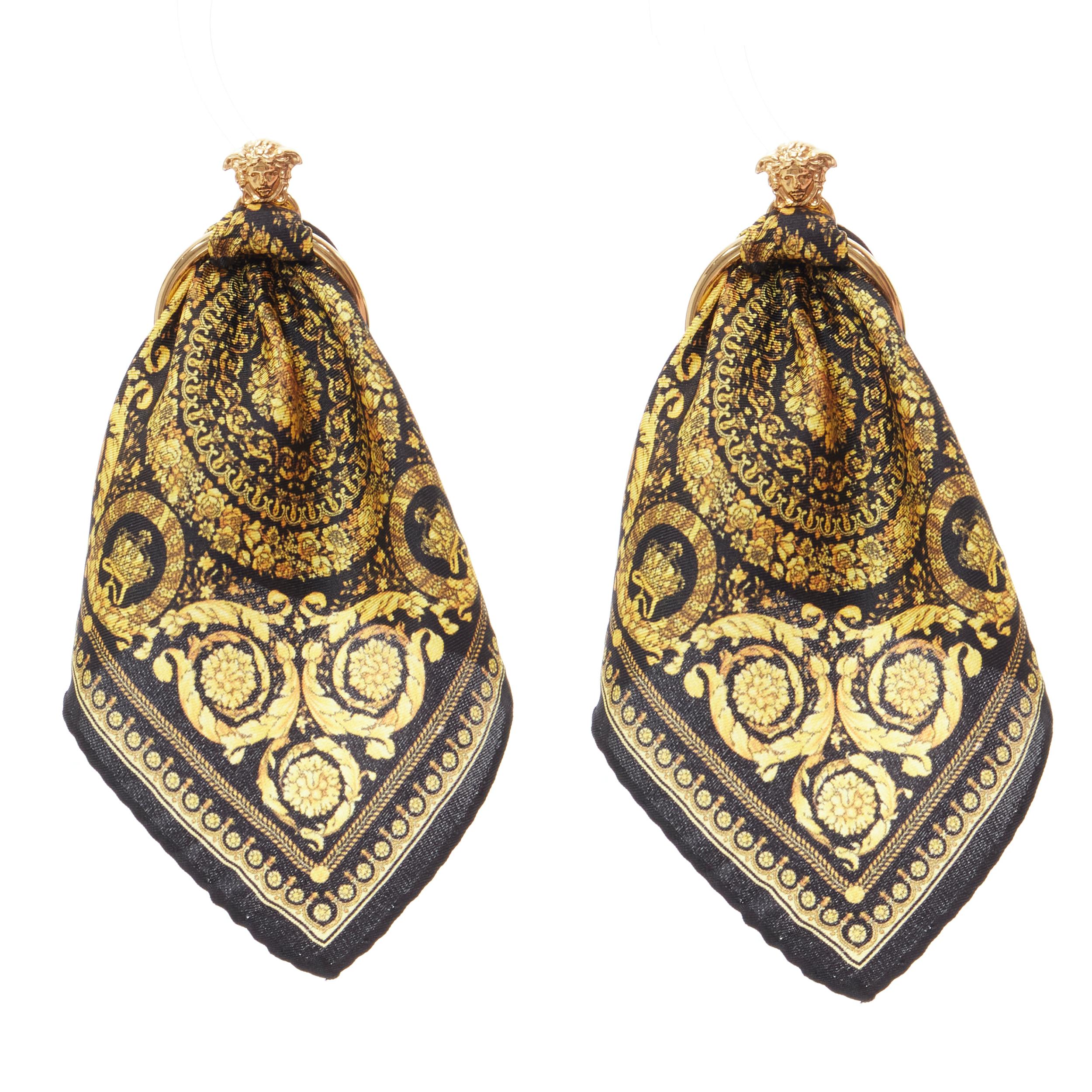 new VERSACE Barocco black gold baroque print scarf convertible Medusa earring 
Reference: TGAS/B01472
 Brand: Versace 
Designer: Donatella Versace 
Collection: 2018 Runway 
As seen on: Beyonce 
Material: Brass 
Color: Black 
Closure: Pin 
Extra