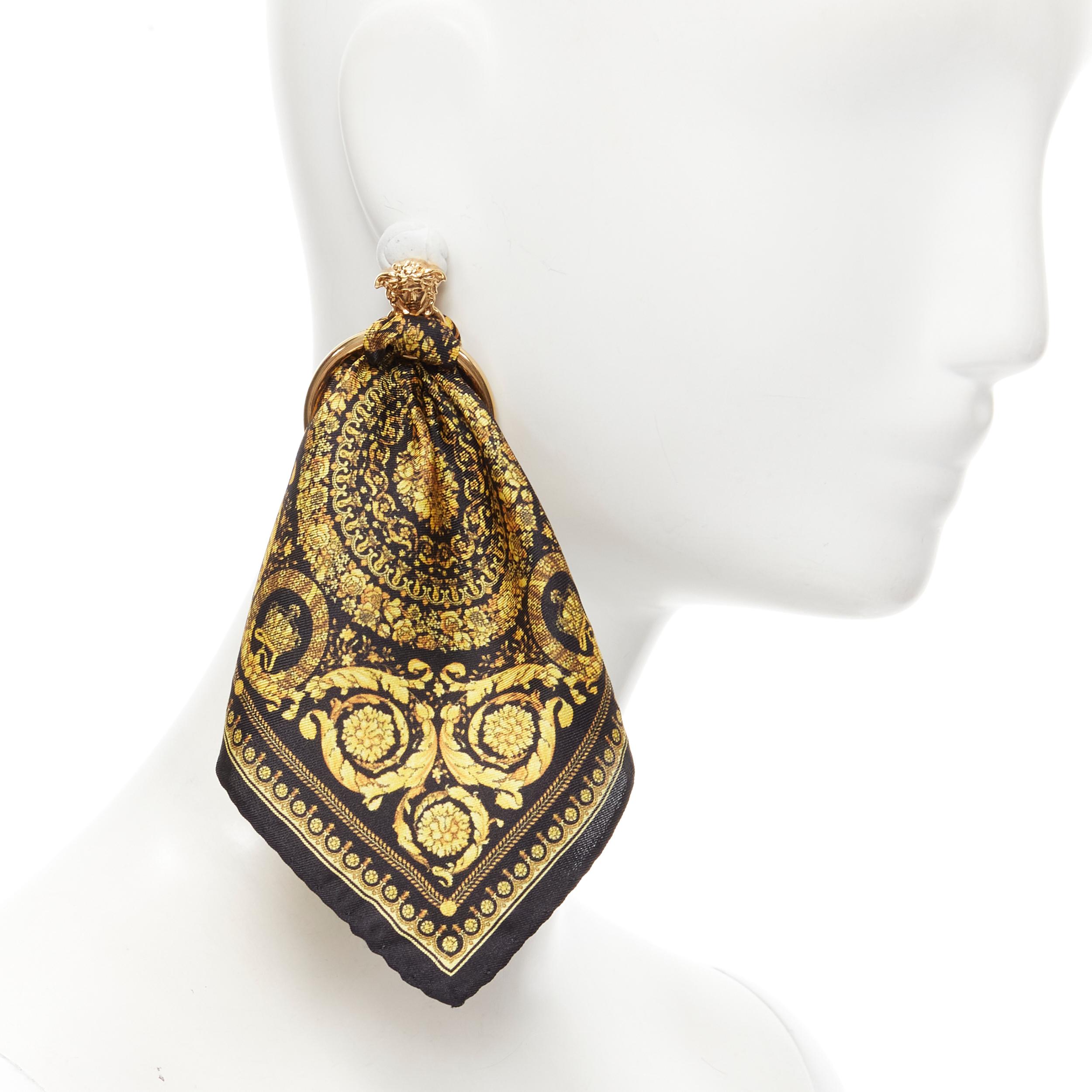 new VERSACE Barocco black gold baroque print scarf convertible Medusa earring 
Reference: TGAS/B01473 
Brand: Versace 
Designer: Donatella Versace 
Collection: 2018 Runway 
As seen on: Beyonce 
Material: Brass 
Color: Black
Closure: Pin 
Extra