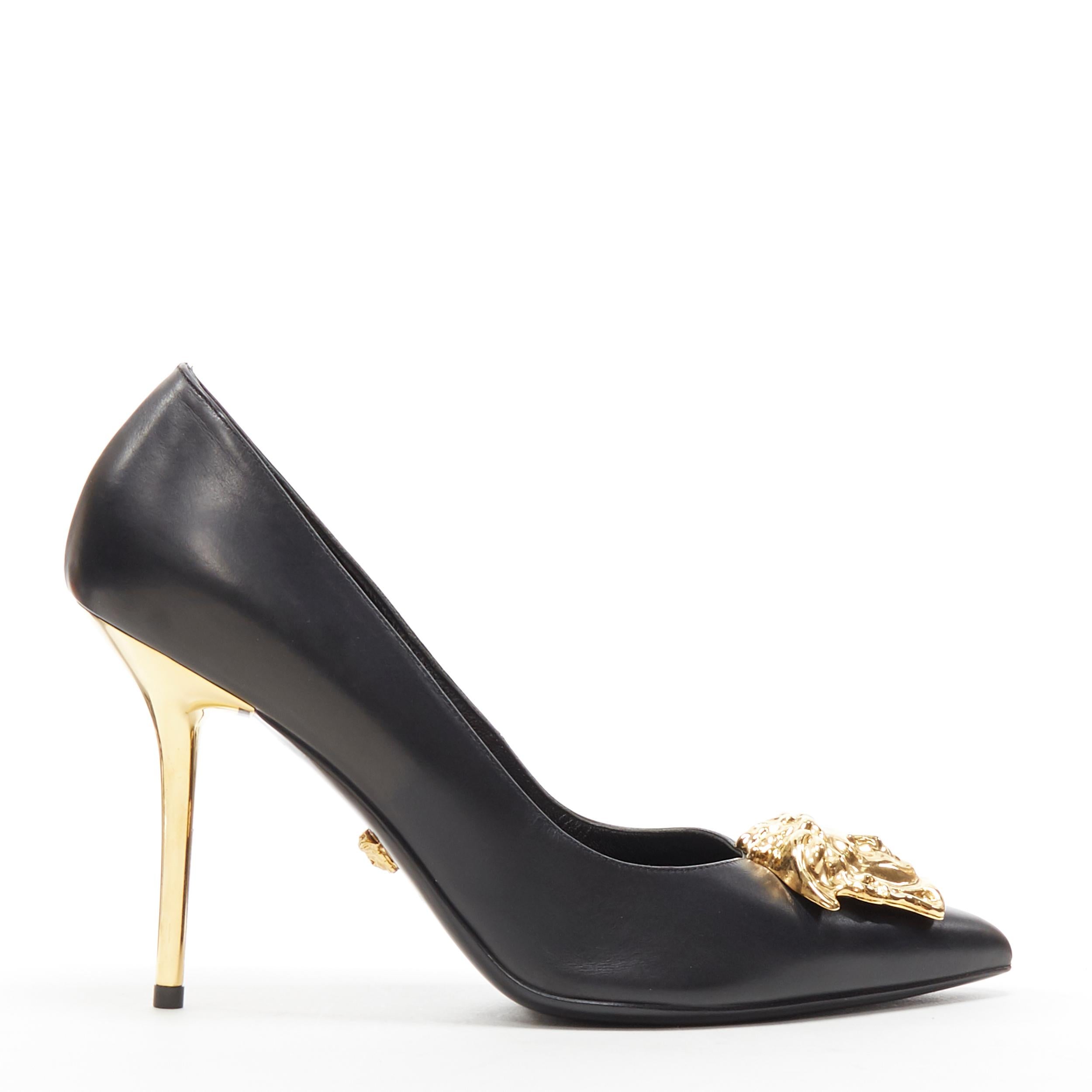 new VERSACE black calf leather champagne gold Medusa pointy pigalle pump EU39 
Brand: Versace
Designer: Donatella Versace
Model Name / Style: Medusa pump
Material: Leather
Color: Black
Pattern: Solid
Closure: Slip on
Extra Detail: High (3-3.9 in)