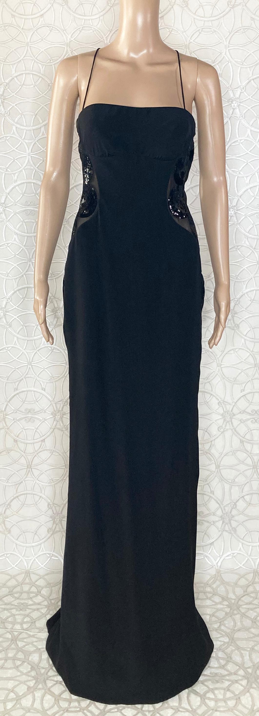 VERSACE 


 Black Silk Long Dress

crossed straps on the back

Palleted Details

Content: 100% silk,
Lining: 100% silk
 IT  Size 38 - US 2



Armpit to armpit: up to 18