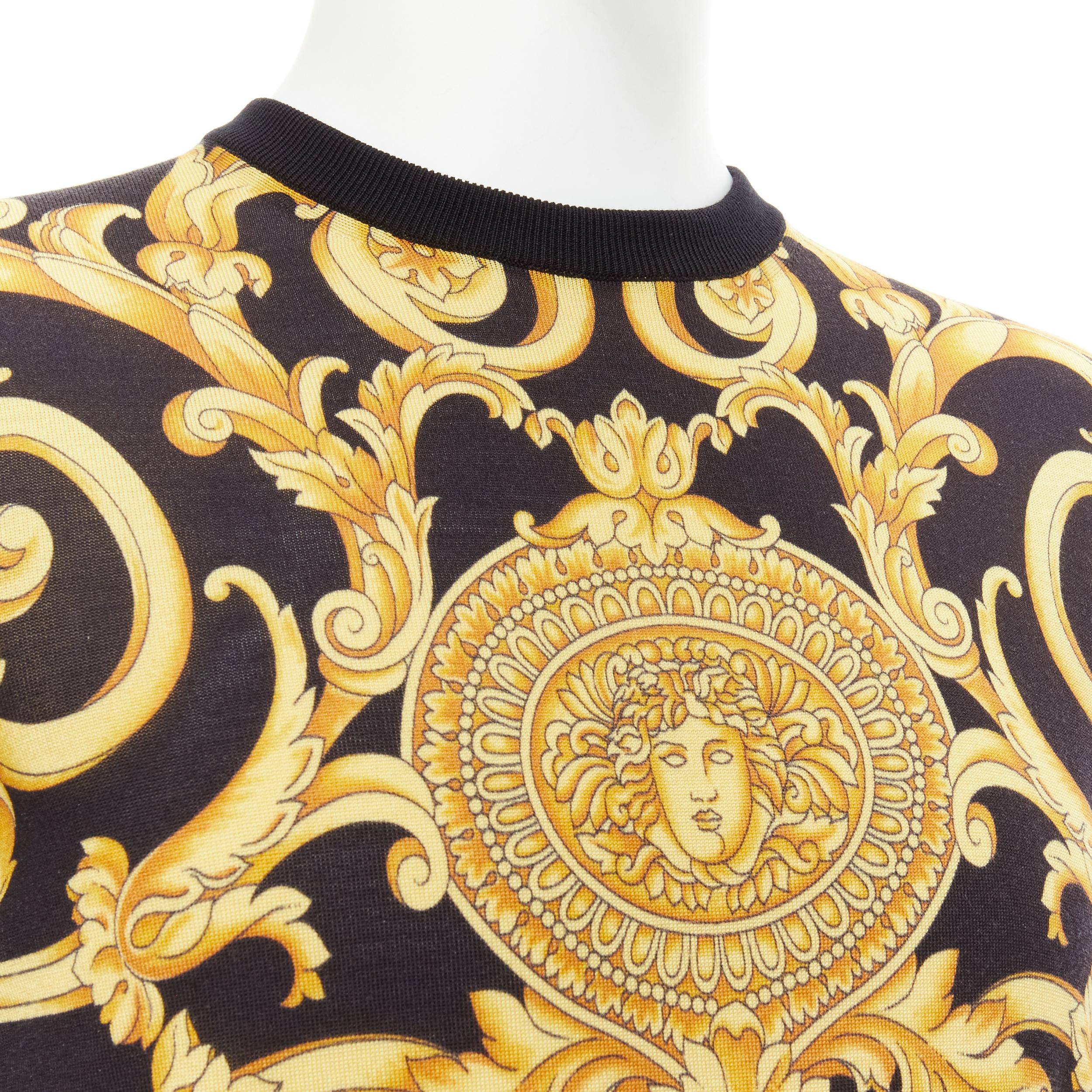 new VERSACE black gold Barocco Hibiscus Medusa 100% silk knit sweater IT48 M
Reference: TGAS/C00285 
Brand: Versace 
Designer: Donatella Versace 
Material: Silk 
Color: Black 
Pattern: Floral 
Extra Detail: 100% silk knit. Black base with signature
