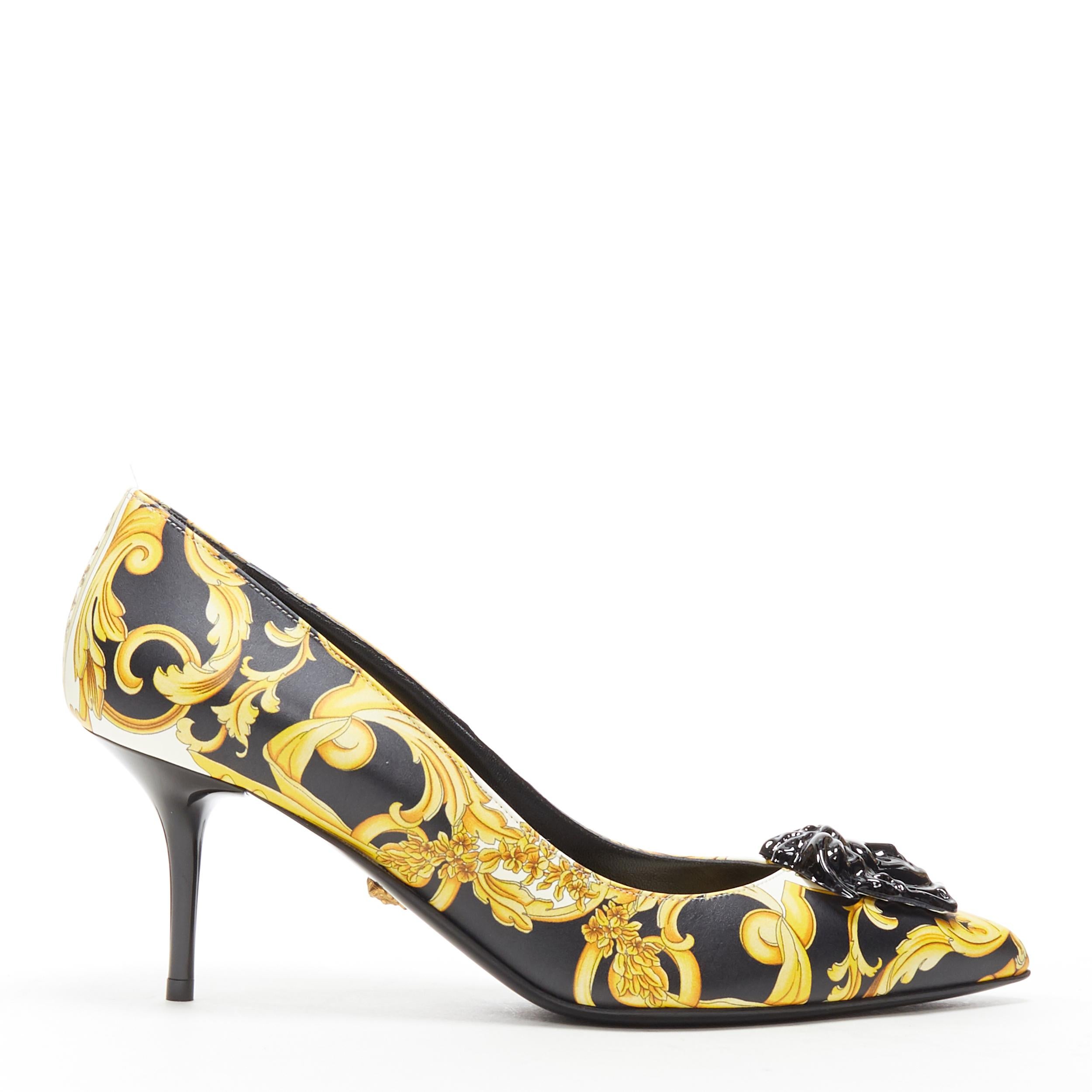 new VERSACE black gold baroque floral Medusa face pointy pigalle pump EU39 
Brand: Versace
Designer: Donatella Versace
Model Name / Style: Palazzo medusa
Material: Leather
Color: Gold
Pattern: Abstract
Extra Detail: High (3-3.9 in) heel height.