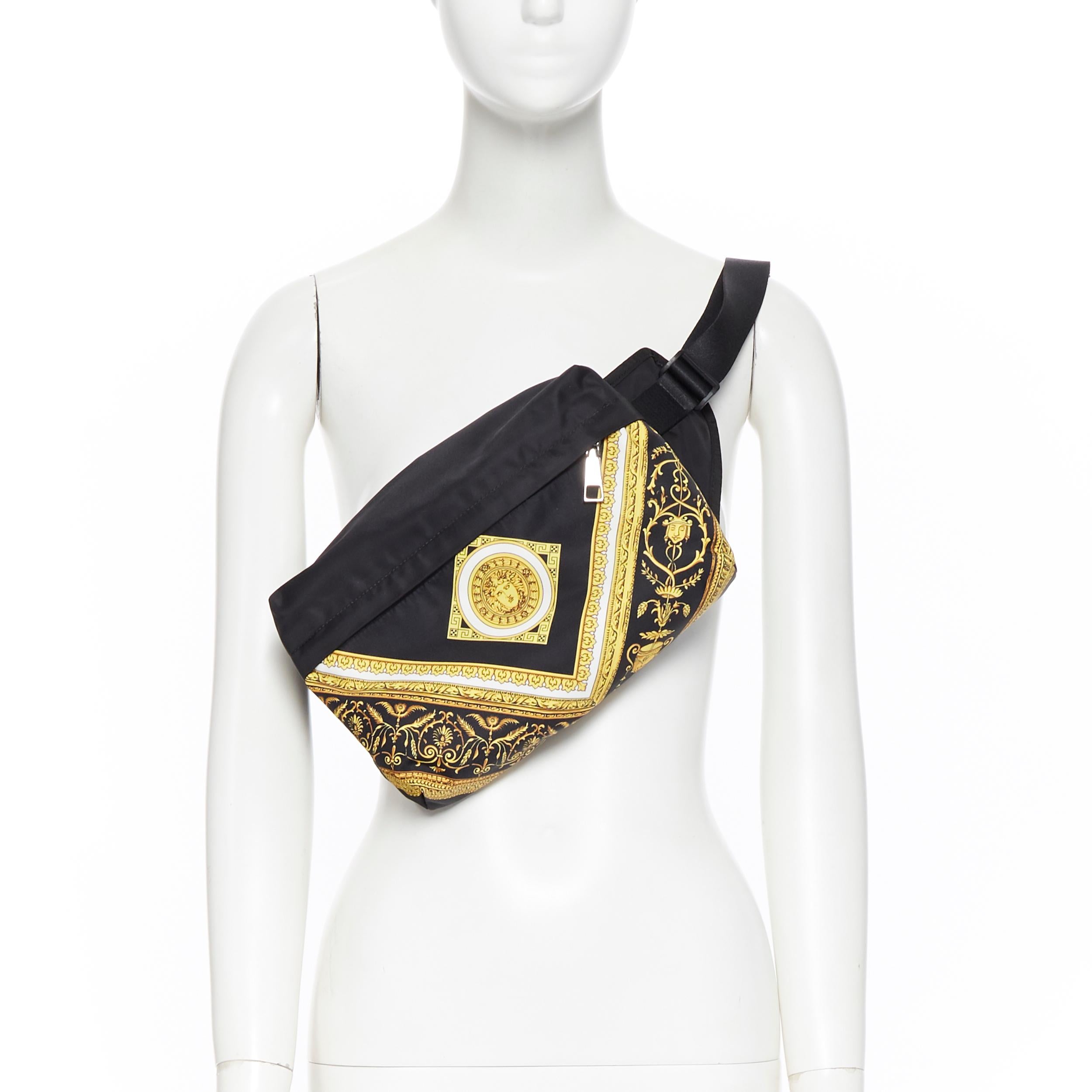 new VERSACE black gold baroque Medusa printed nylon zip front waist fanny bag
Brand: Versace
Designer: Donatella Versace
Collection: 2019
Model Name / Style: Belt bag
Material: Nylon
Color: Black
Pattern: Other
Closure: Zip
Lining material: