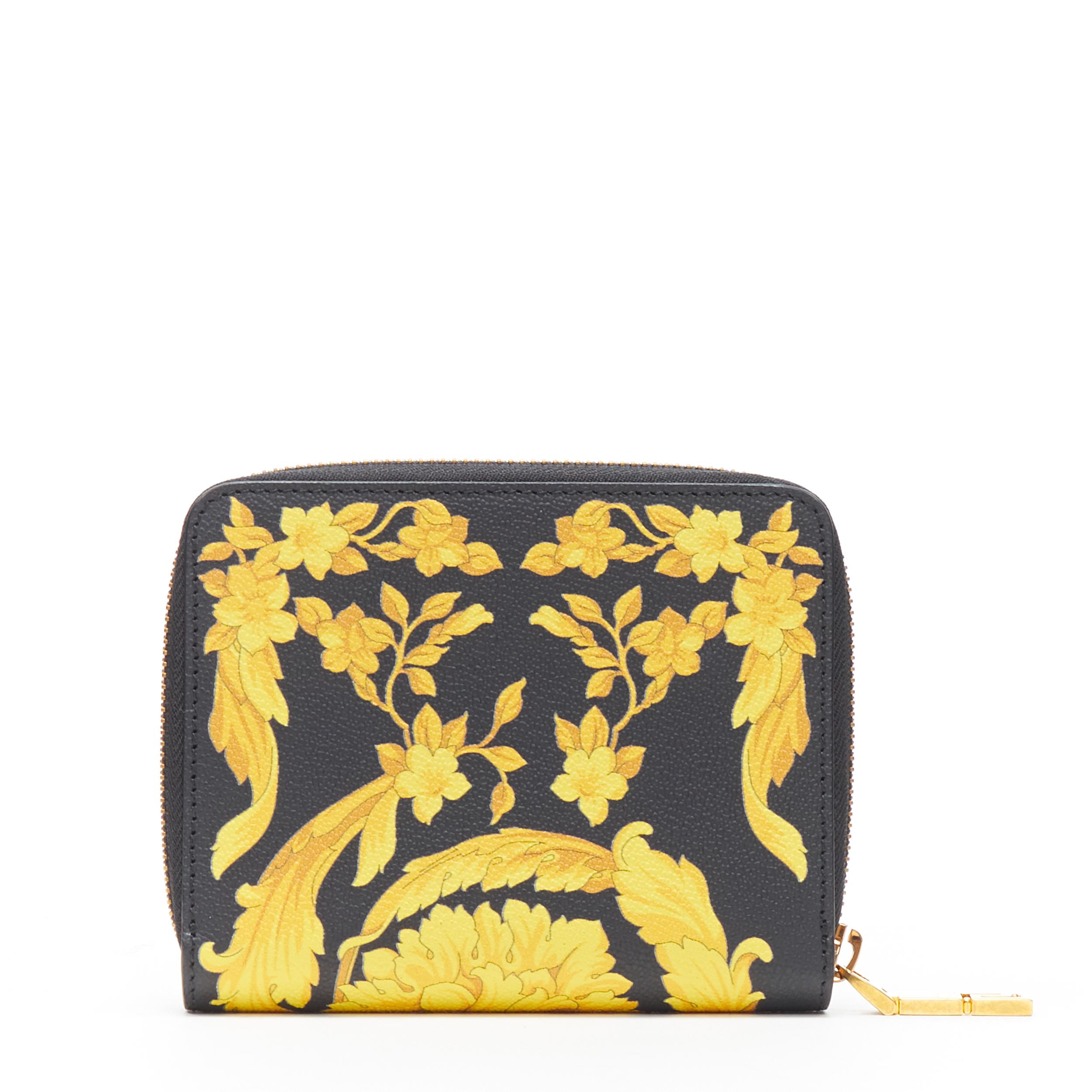new VERSACE Black Gold Baroque print leather gold Medusa face zip around wallet 
Brand: Versace
Designer: Donatella Versace
Collection: 2019
Model Name / Style: Zip around wallet
Material: Leather
Color: Black, gold
Pattern: Floral
Closure: