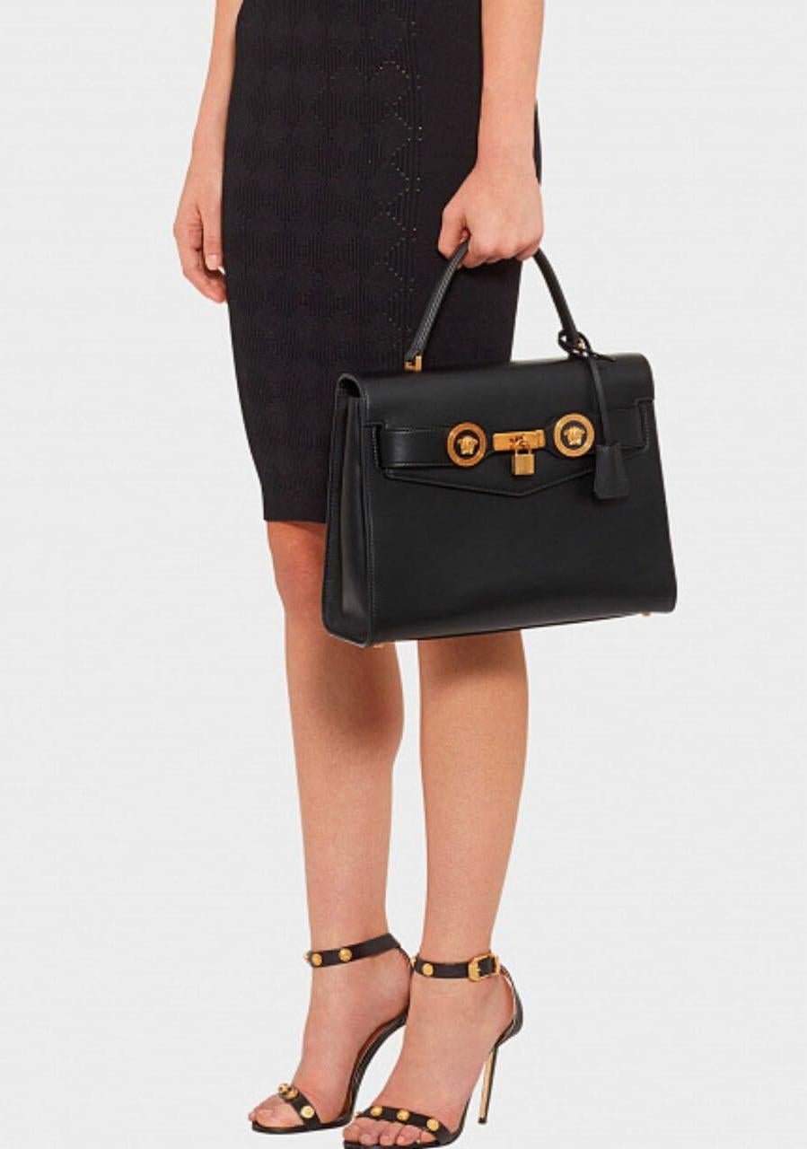 VERSACE

The Icon handbag, a timeless must-have for the woman on the go. The bag to take you from desk to drinks - from uptown to downtown, the Icon is that staple addition for the Versace woman's wardrobe.

Top handle.

Removable shoulder