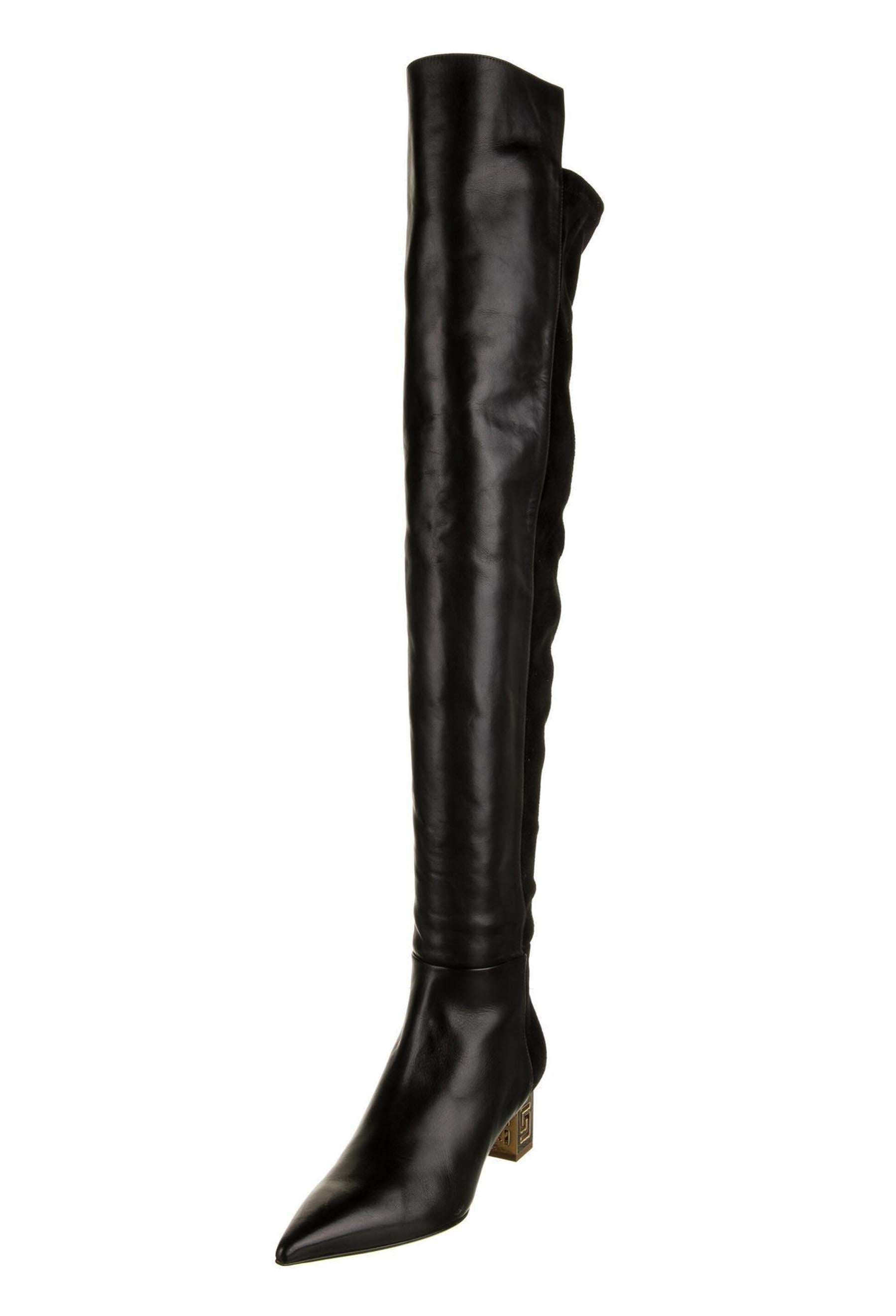 New Versace Black Greek Key Heel  Thigh High Boots
Italian size - 38.
Black Leather and Stretch Suede, Over the Knee Style, Gold Tone Metal Greek Motive Heel, Side Half Zip Closure, Pointed Toe Silhouette.
Measurements Approx.: Total Height - 28