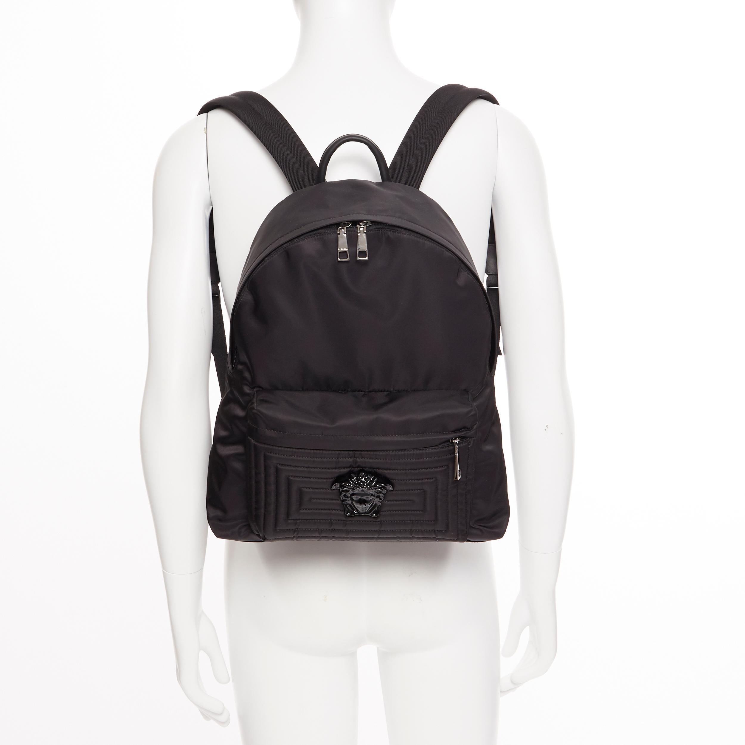 new VERSACE black Palazzo Medusa Greca nylon stitching pocket backpack bag
Brand: Versace
Designer: Donatella Versace
Model Name / Style: Medusa backpack
Material: Nylon
Color: Black
Pattern: Solid
Closure: Zip
Extra Detail: Black nylon fabric