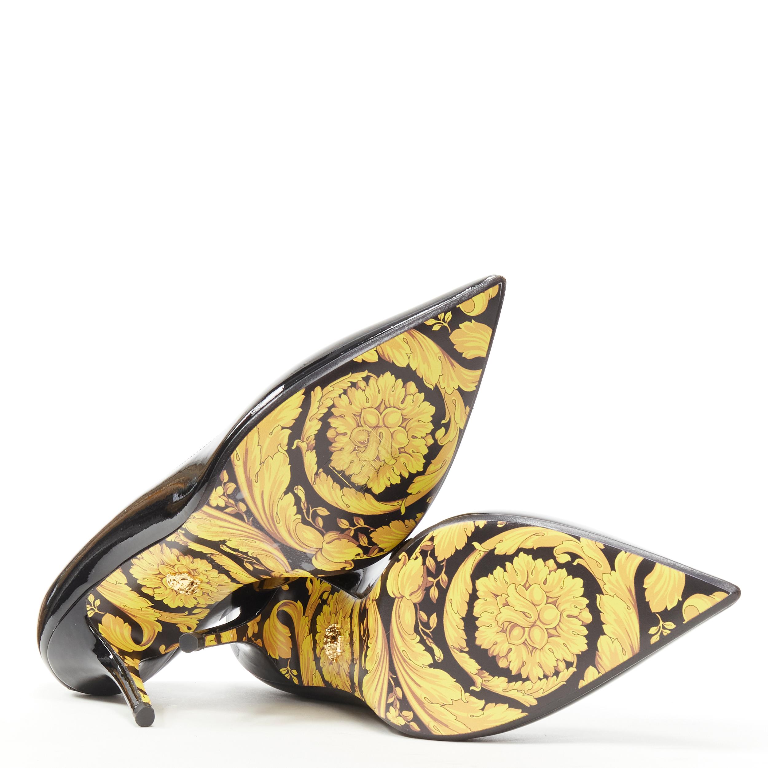 new VERSACE black patent leather gold Medusa stud Barocco print sole pump EU37.5 
Reference: TGAS/C00073 
Brand: Versace 
Designer: Donatella Versace 
Material: Patent Leather 
Color: Black 
Extra Detail: Gold-tone Medusa stud at heel. All-over