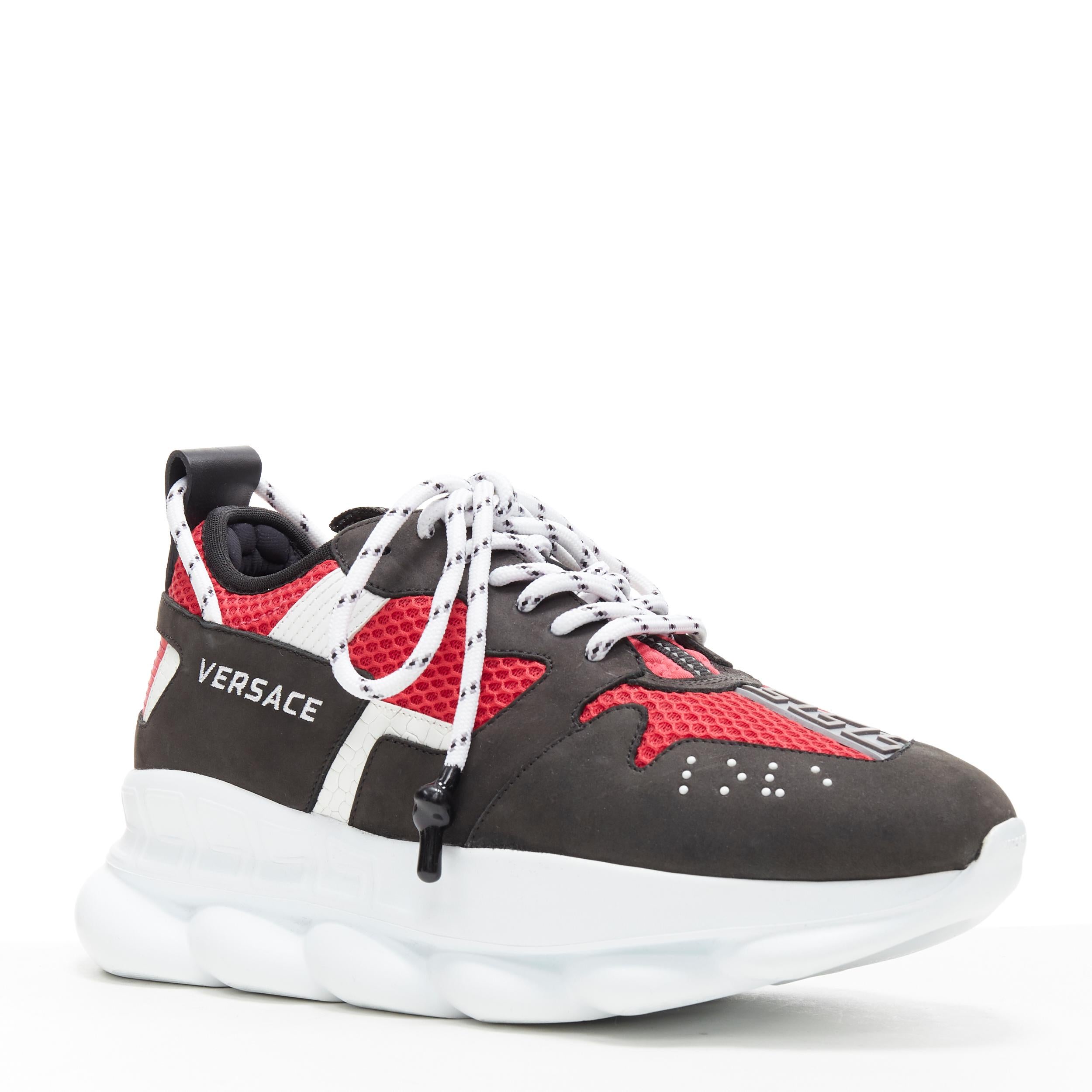 new VERSACE Chain Reaction black suede fuschia red low chunky sneaker EU37 US7 
Reference: TGAS/A06297 
Brand: Versace 
Designer: Salehe Bembury 
Model: Chain Reaction Black Red 
Material: Leather 
Color: Black 
Pattern: Solid 
Closure: Lace up