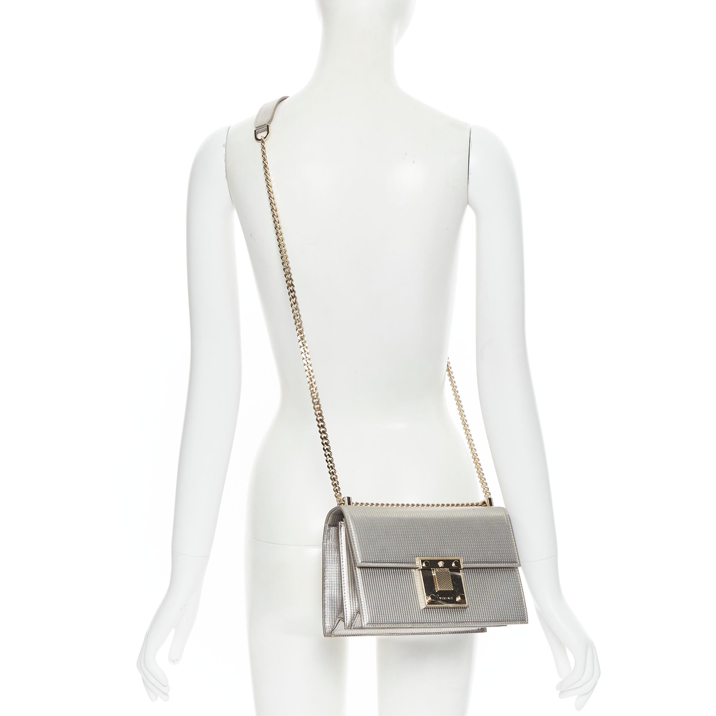 new VERSACE Diamente silver leather gold Medusa chunky chain structured bag 
Reference: TGAS/B00748 
Brand: Versace 
Designer: Donatella Versace 
Model: Diamente bag 
Material: Leather 
Color: Silver 
Pattern: Solid 
Closure: Clasp 
Extra Detail: