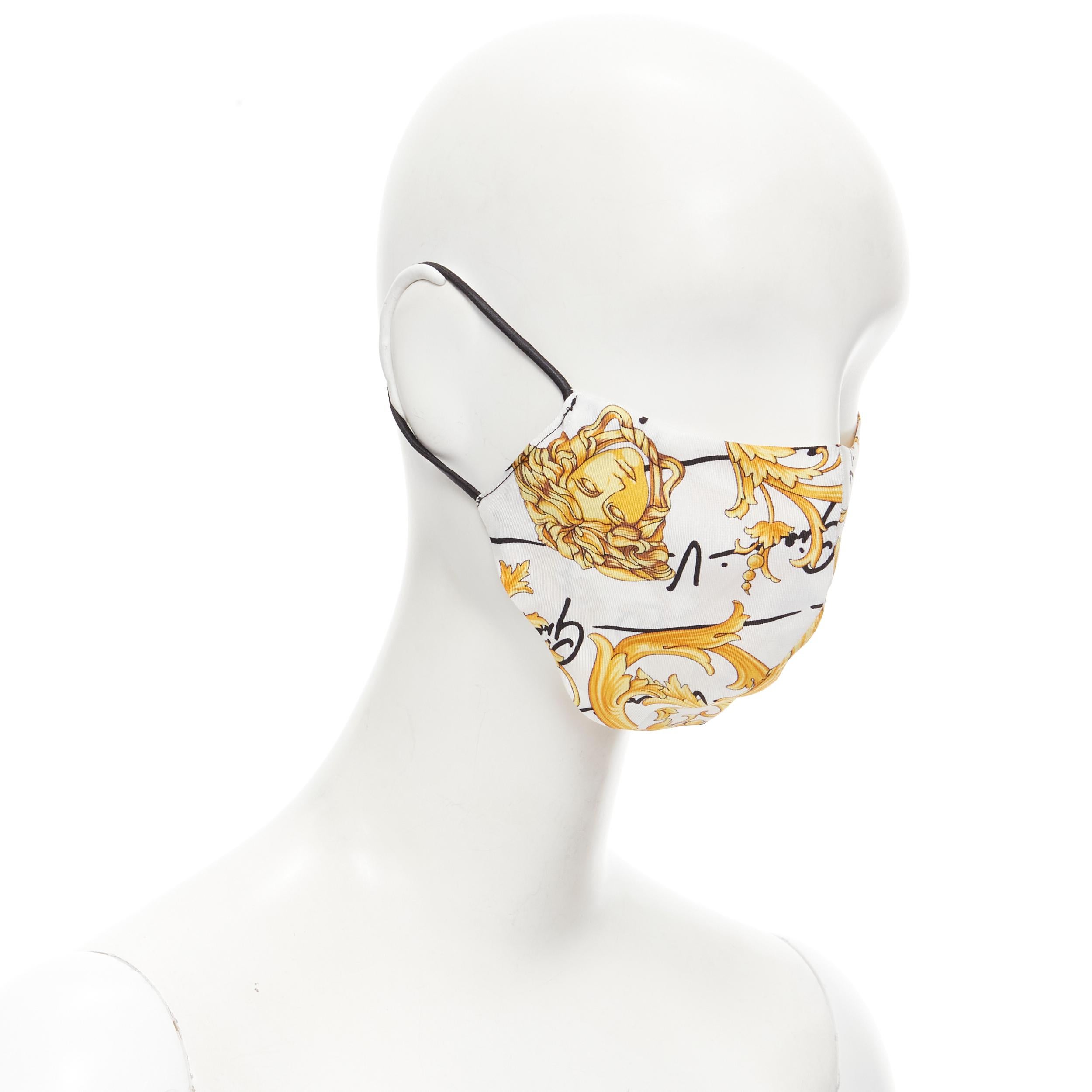 new VERSACE Gianni Signature Barocco Medusa Baroque 100% silk face mask
Reference: CNLE/A00145
Brand: Versace
Designer: Donatella Versace
Model: Barocco silk mask
Collection: Barocco
Material: 100% Silk
Color: White, Gold
Pattern: Floral
Lining: