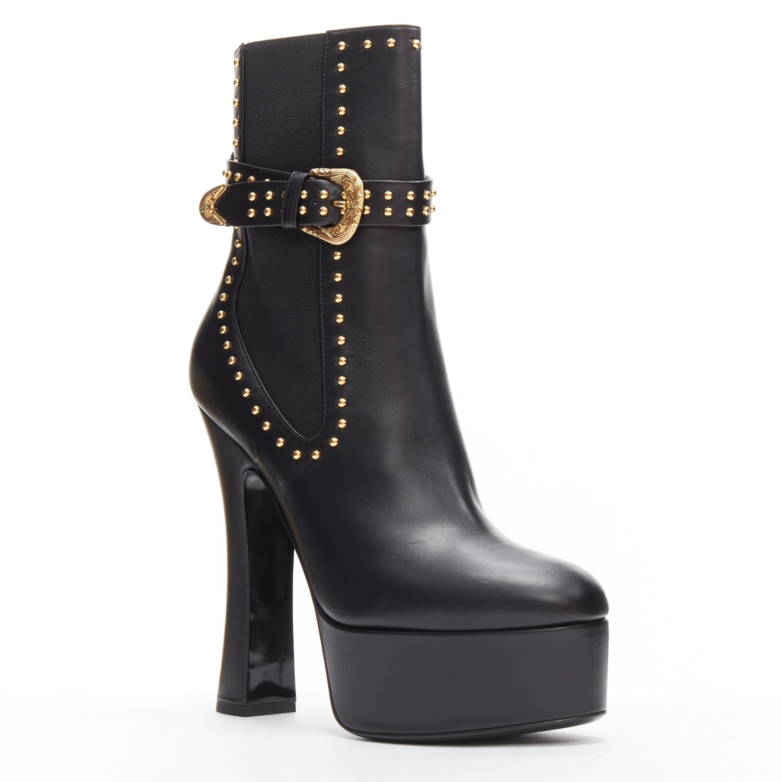 new VERSACE gold studded western buckle black leather platform boots EU38.5

Reference: TGAS/C01794

Brand: Versace

Designer: Donatella Versace

Model: DST203T DVT4X D41OH

Material: Leather

Color: Black

Pattern: Solid

Estimated Retail Price:
