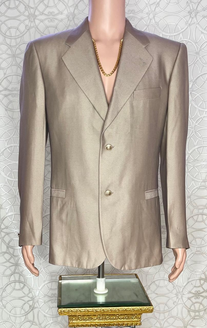 VERSACE

Blazer Jacket 

Two Gold-plated Medusa Buttons 
Two side pockets
Gold-plated Medusa Buttons on the sleeves

Content: 

Lining: 

Italian Size 50 - US 40 (L)

Shoulder to shoulder 