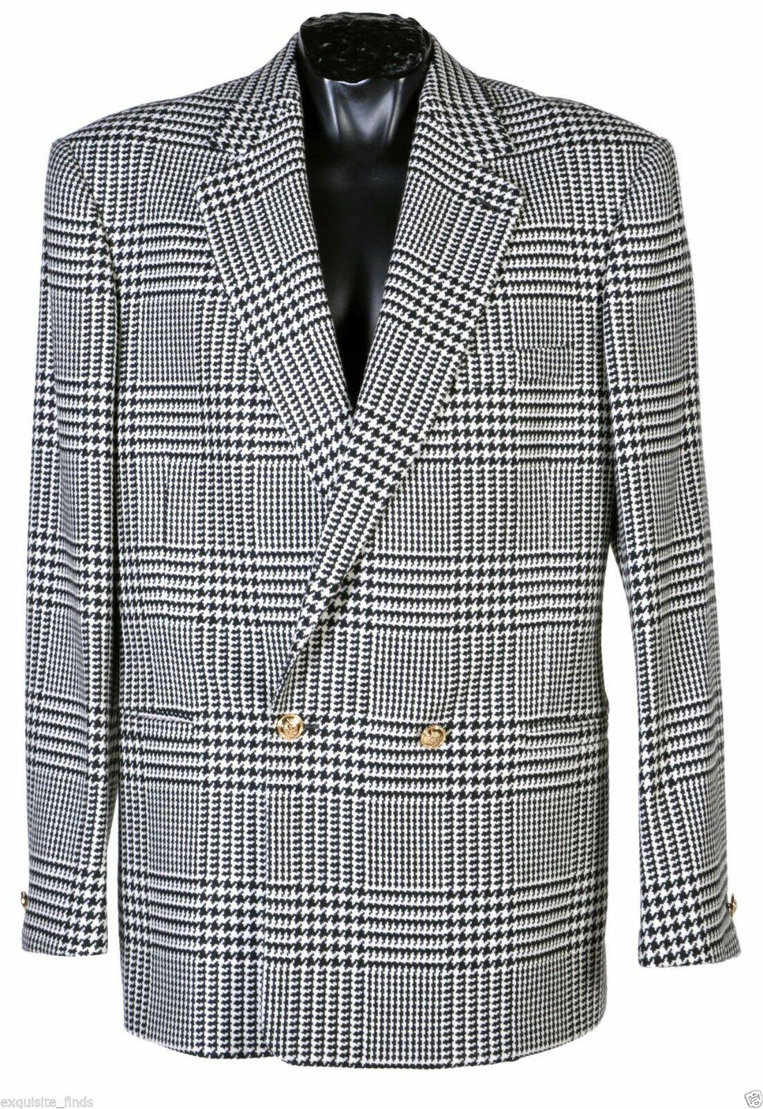 VERSACE  MEN'S SUIT

TAILOR MADE
95% wool, 5% cashmere
The jacket features: double-breasted Italian design, two side pockets, one chest pocket, one button sleeves and 3 inner finished pockets.  
Medusa lining
 
Medusa buttons

Italian size 56 - US