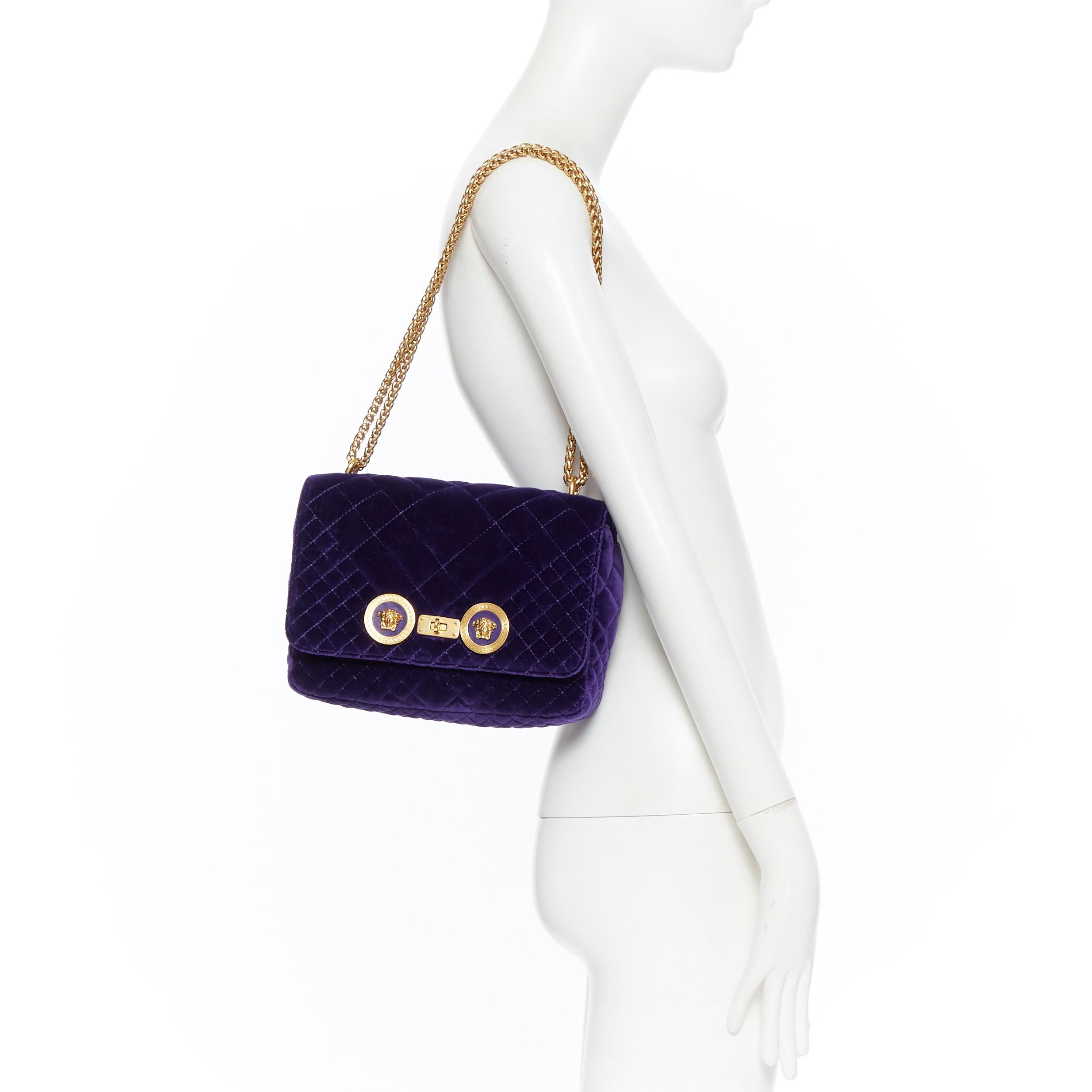 new VERSACE Icon Medium purple quilted velvet dual Medusa gold chain flap bag
Brand: Versace
Designer: Donatella Versace
Model Name / Style: Icon bag
Material: Velvet
Color: Purple
Pattern: Solid
Closure: Turnlock
Lining material: Canvas
Extra
