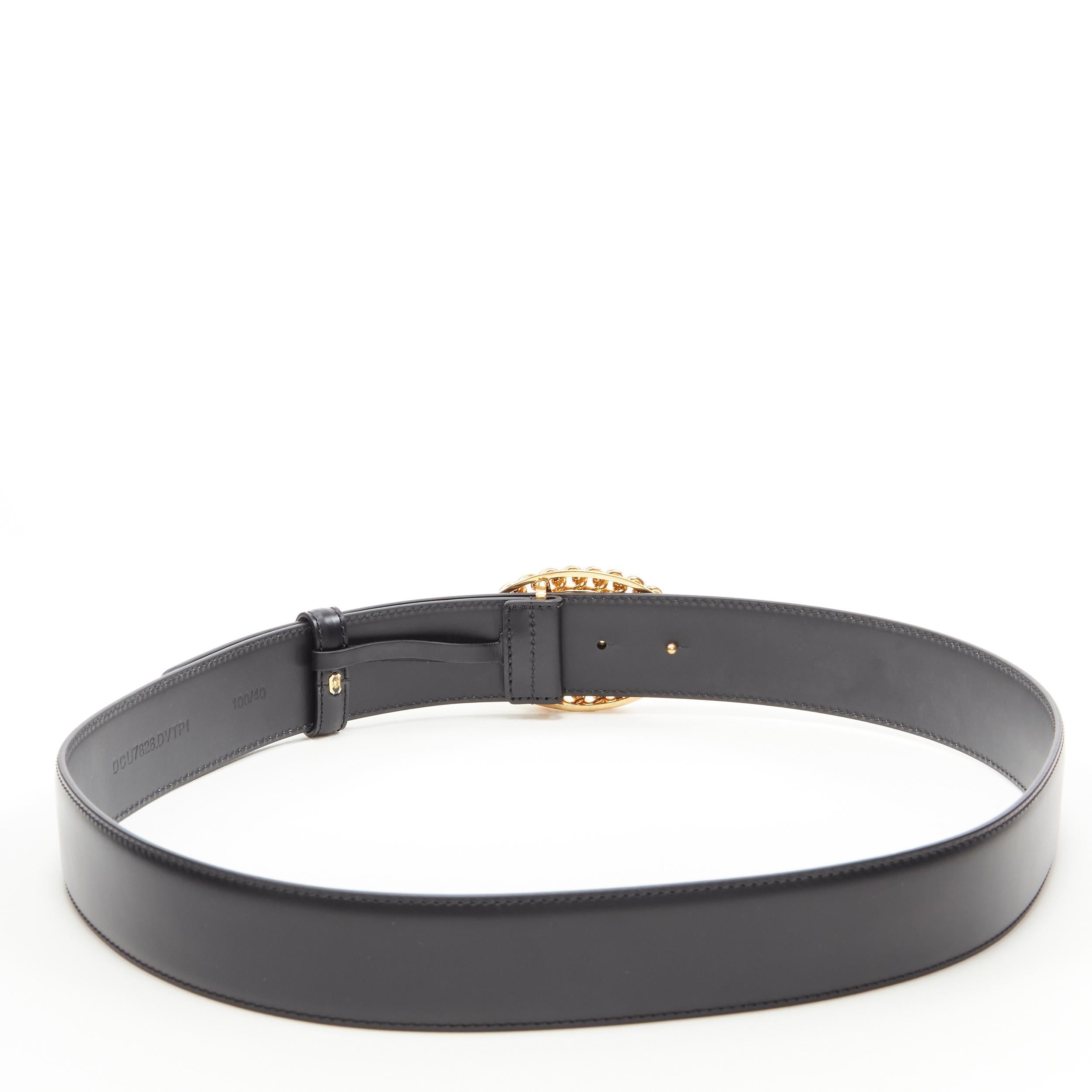 black belt with gold chain