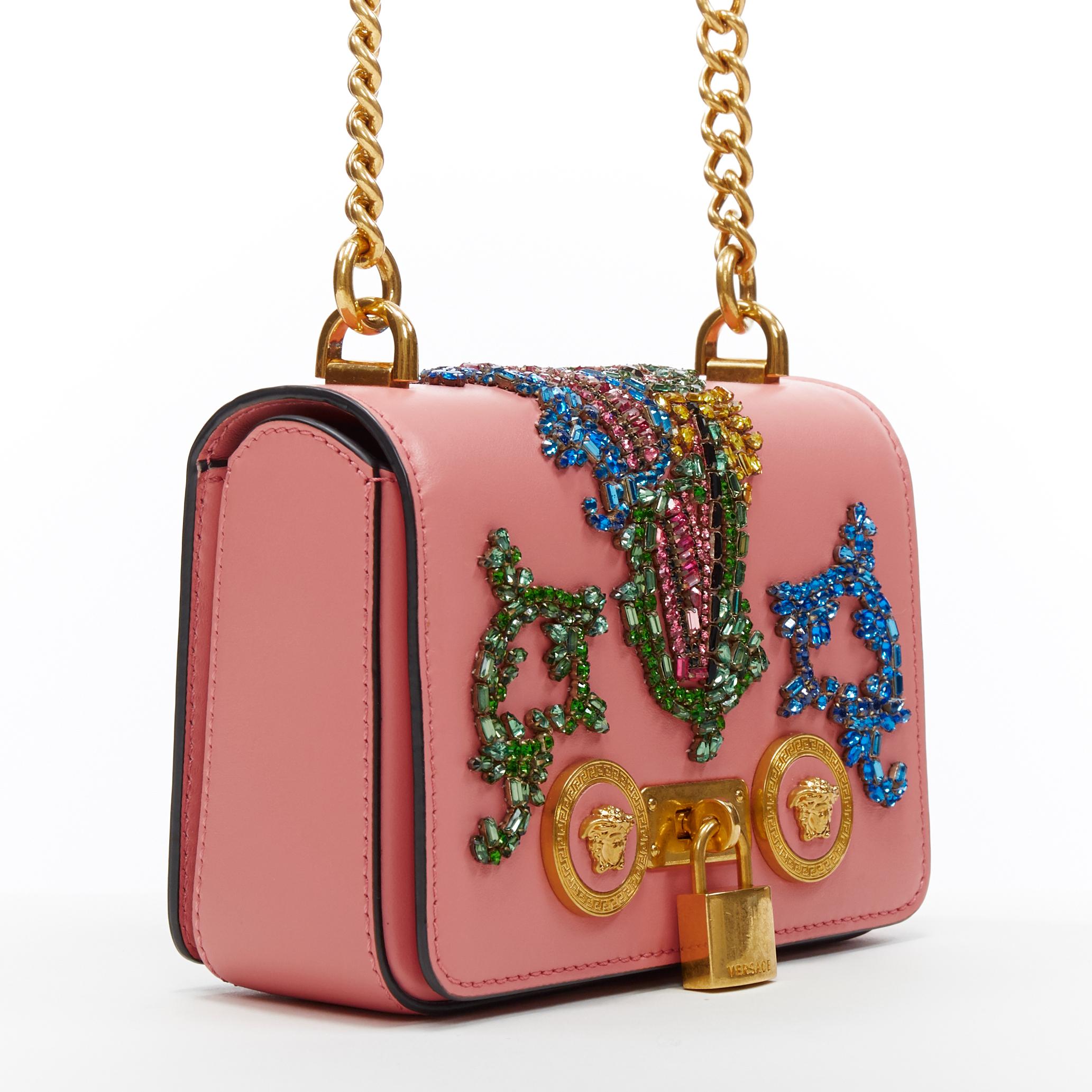 new VERSACE Mini Icon pink baroque Virtus V crystal embellished shoulder bag
Brand: Versace
Designer: Donatella Versace
Collection: 2019
Model Name / Style: Mini Icon
Material: Leather
Color: Pink
Pattern: Abstract
Closure: Turnlock
Lining material: