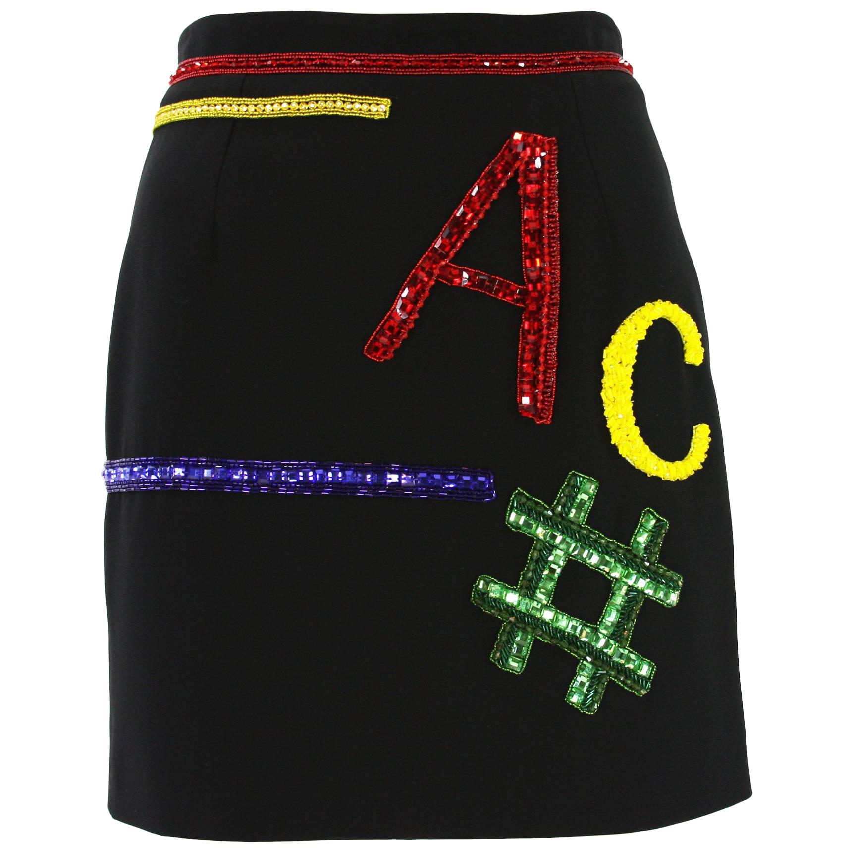 Versace Mini jupe en soie noire perlée de cristaux Swarovski, Taille IT 40, Neuf