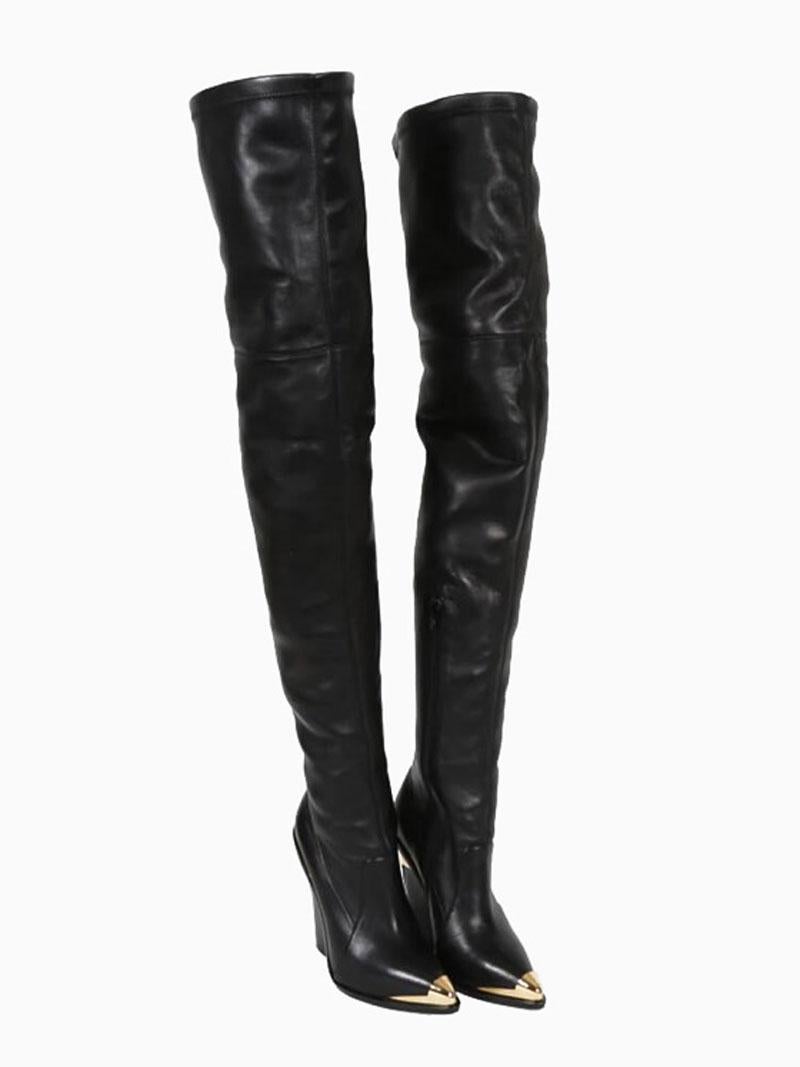 New Versace Over-the-knee Black Boots
Designer size 36
Black leather, pointed-toe over-the-knee boots with gold-tone hardware, stacked heels and zip closures at sides.
Measurements: Calf Circumference 16