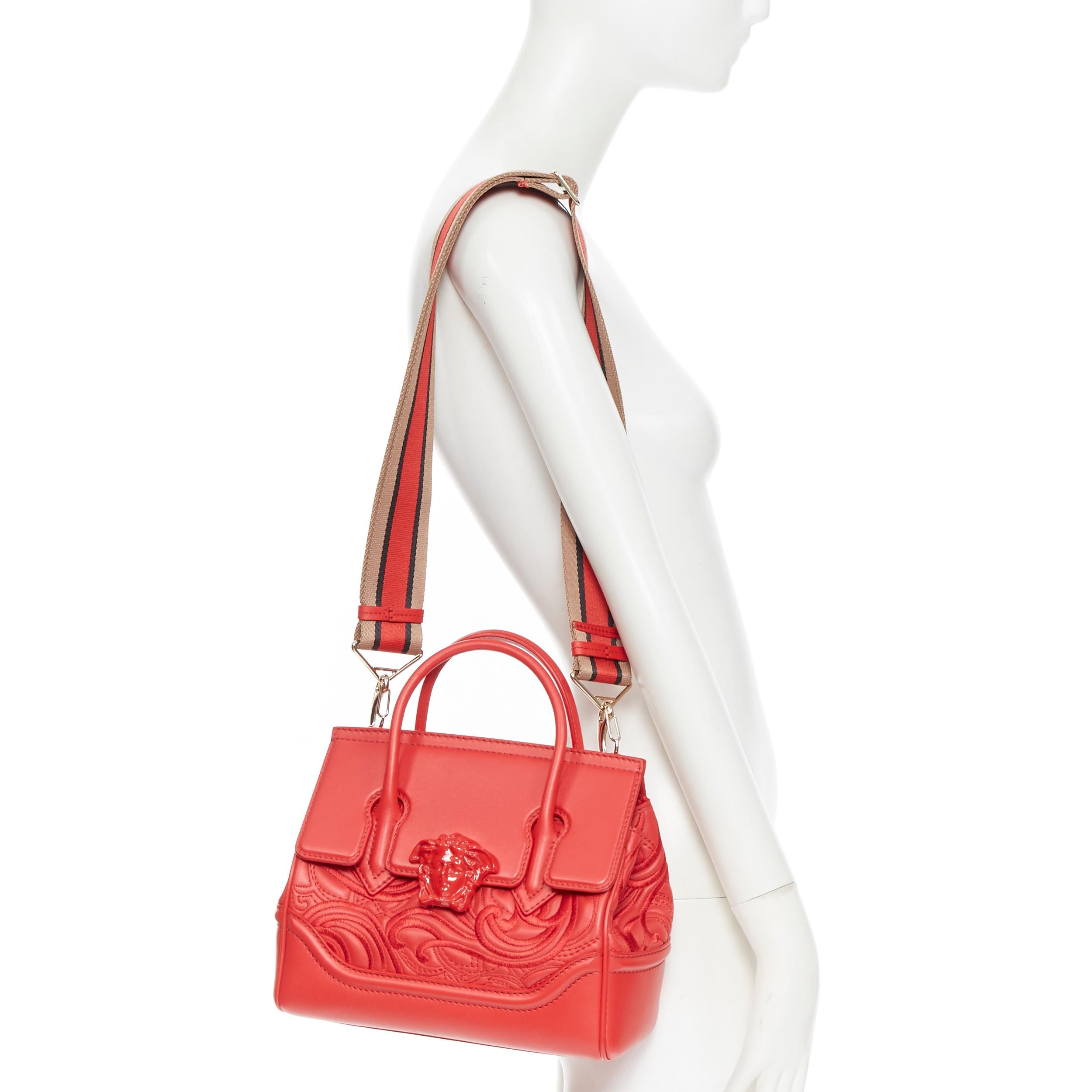 new VERSACE Palazzo Empire Small Baroque Embroidered red Medusa satchel bag 
Brand: Versace
Designer: Donatella Versace
Collection: 2019
Model Name / Style: Palazzo Empire
Material: Leather
Color: Red
Pattern: Floral
Closure: Clasp
Lining material: