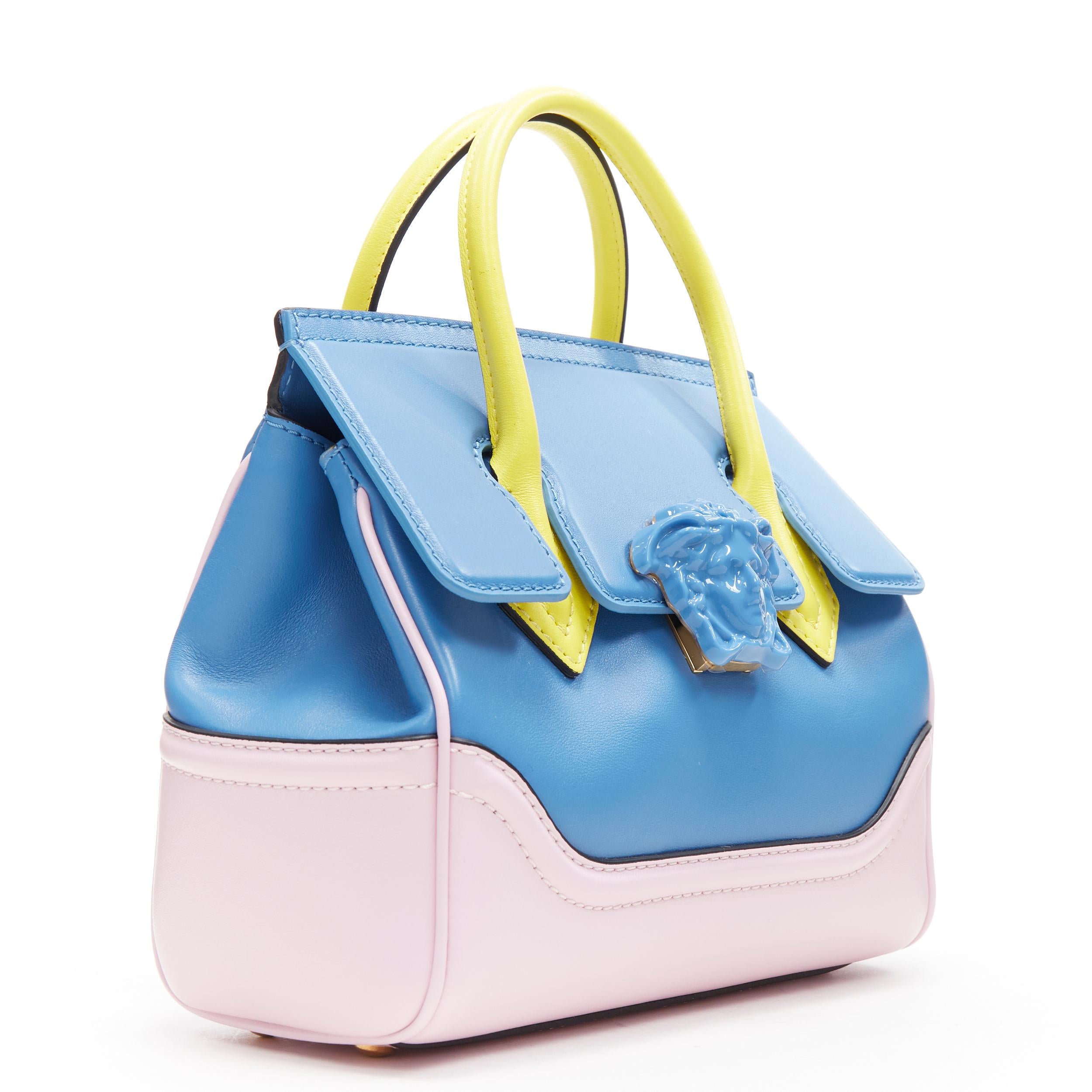 new VERSACE Palazzo Empire Small blue pink yellow pastel colorblocked Medusa bag
Brand: Versace
Designer: Donatella Versace
Collection: Spring Summer 2018
Model Name / Style: Versace Empire
Material: Leather
Color: Blue, pink
Pattern: Solid
Closure: