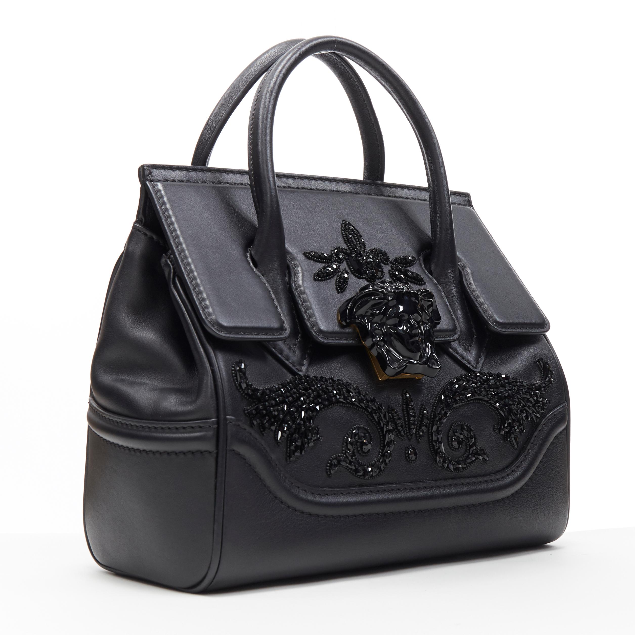 new VERSACE Palazzo Empire Small crystal baroque embellished Medusa satchel bag 
Brand: Versace
Designer: Donatella Versace
Collection: 2019
Model Name / Style: Palazzo Empire
Material: Leather
Color: Black
Pattern: Solid
Closure: Clasp
Lining