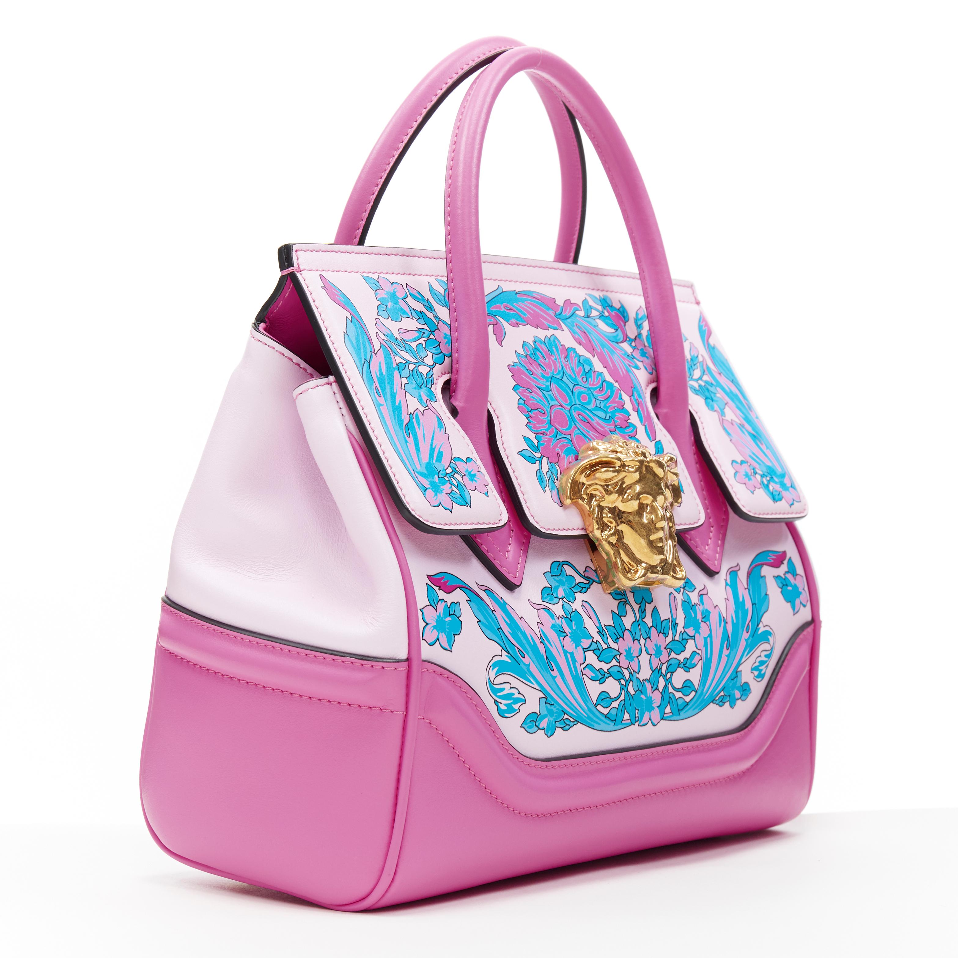 new VERSACE Palazzo Empire Small Technicolor Baroque pink Medusa tote bag 
Brand: Versace
Designer: Donatella Versace
Collection: 2019
Model Name / Style: Palazzo Empire
Material: Leather
Color: Pink
Pattern: Floral
Closure: Clasp
Lining material: