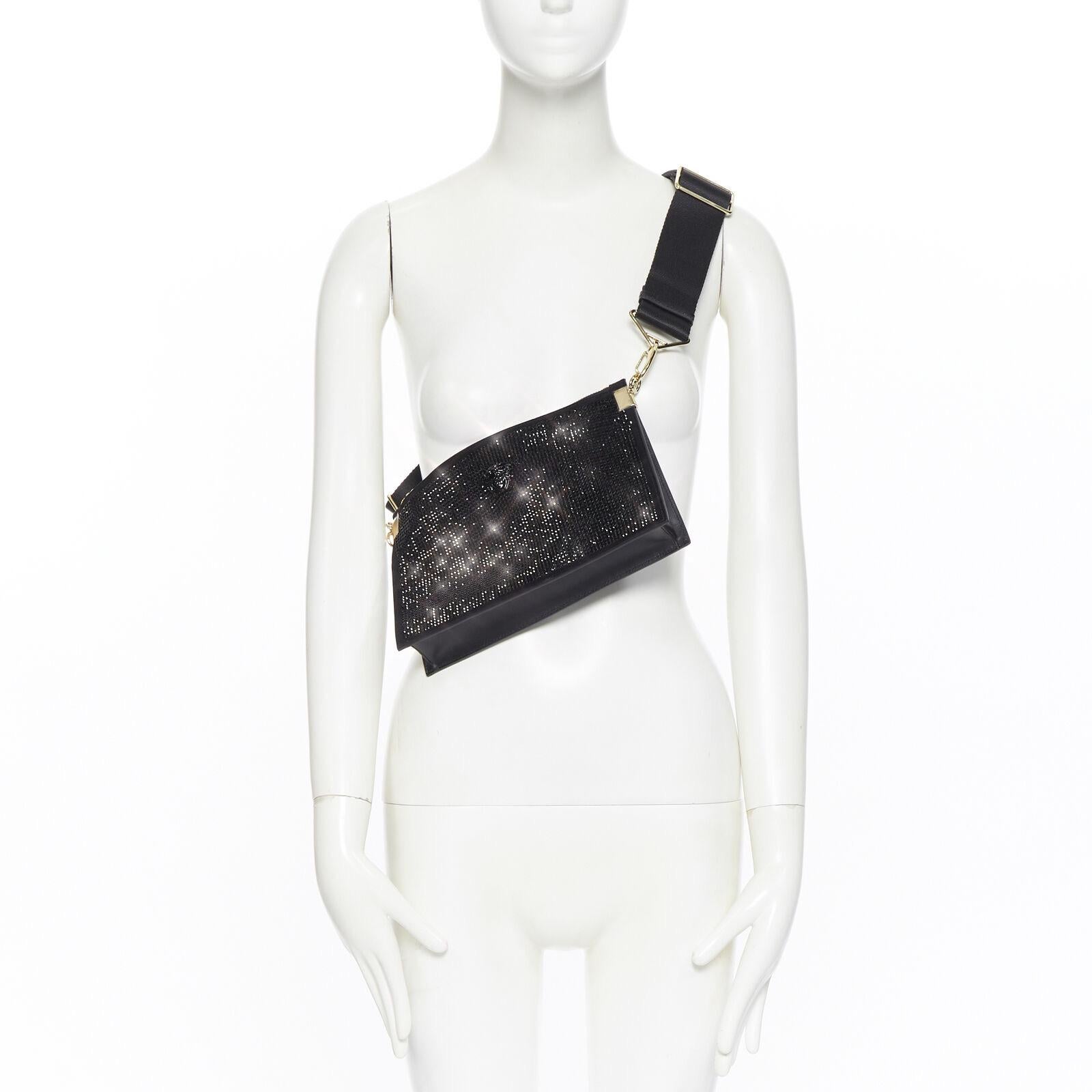 new VERSACE Palazzo Medusa black crystal strass goat clutch crossbody bag 
Reference: TGAS/A04204 
Brand: Versace 
Designer: Donatella Versace 
Model: Palazzo Medusa crystal 
Collection: 2019 
Material: Leather 
Color: Black 
Pattern: Solid