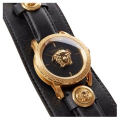 Versace, montre-bracelet Palazzo Medusa convertible en cuir gréca noir et or avec poignée en forme de manchette, neuve